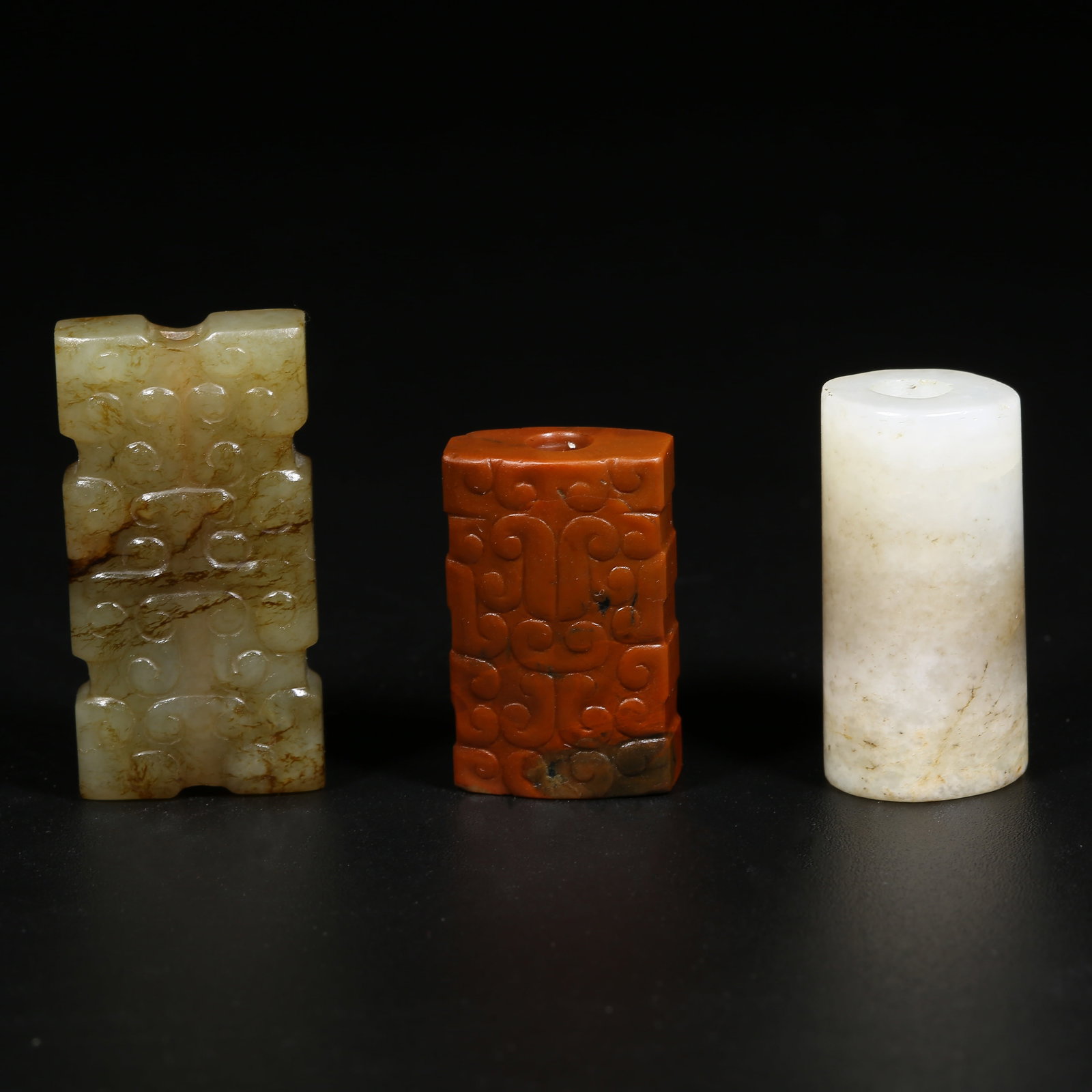 A SET OF ANCIENT JADE PENDANT FITTINGS: Set of Ancient Jade Pendant Fittings