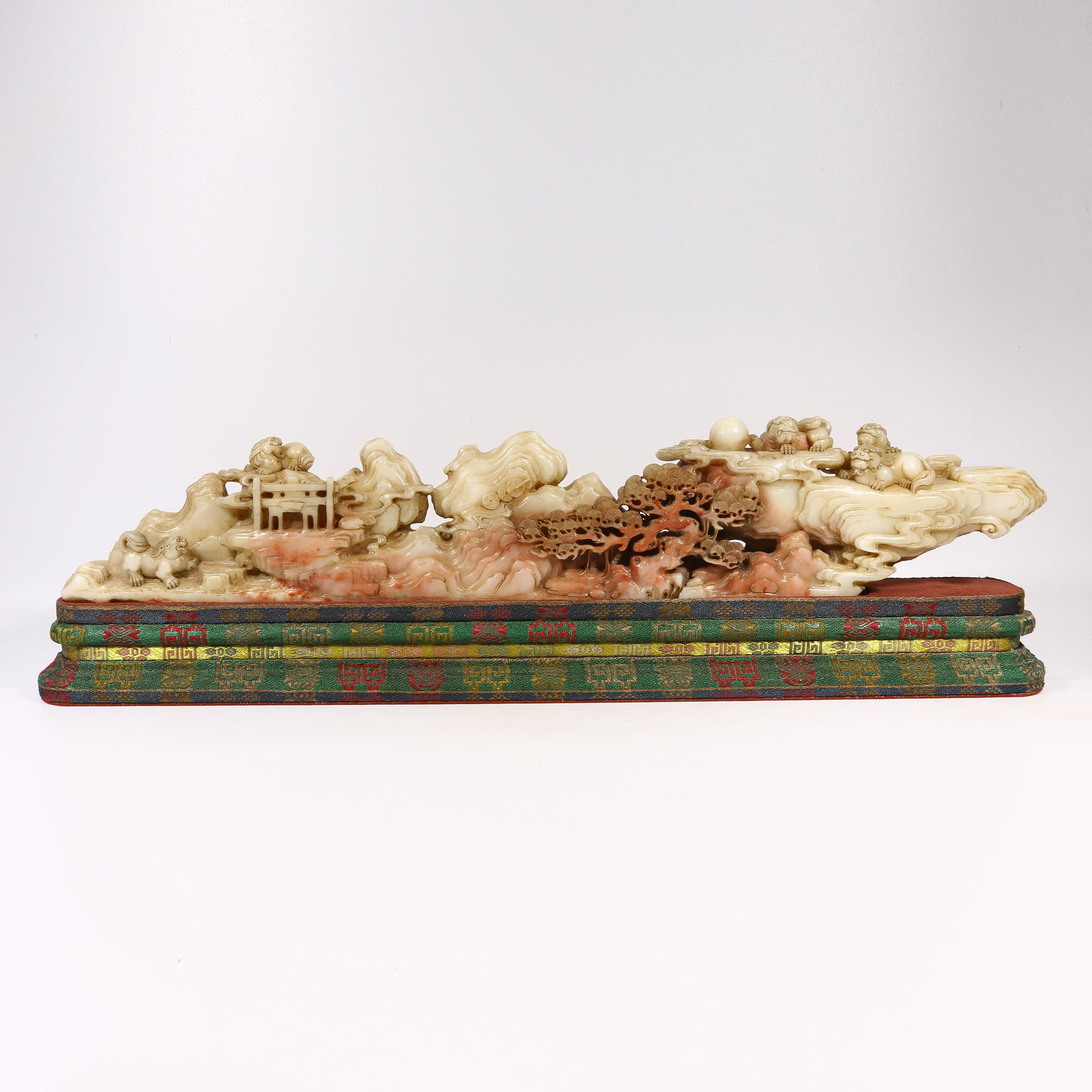 A SHOUSHAN STONE AUSPICIOUS BEAST PATTERN MINIATURE MOUNTAIN: Shoushan stone auspicious beast pattern miniature mountain