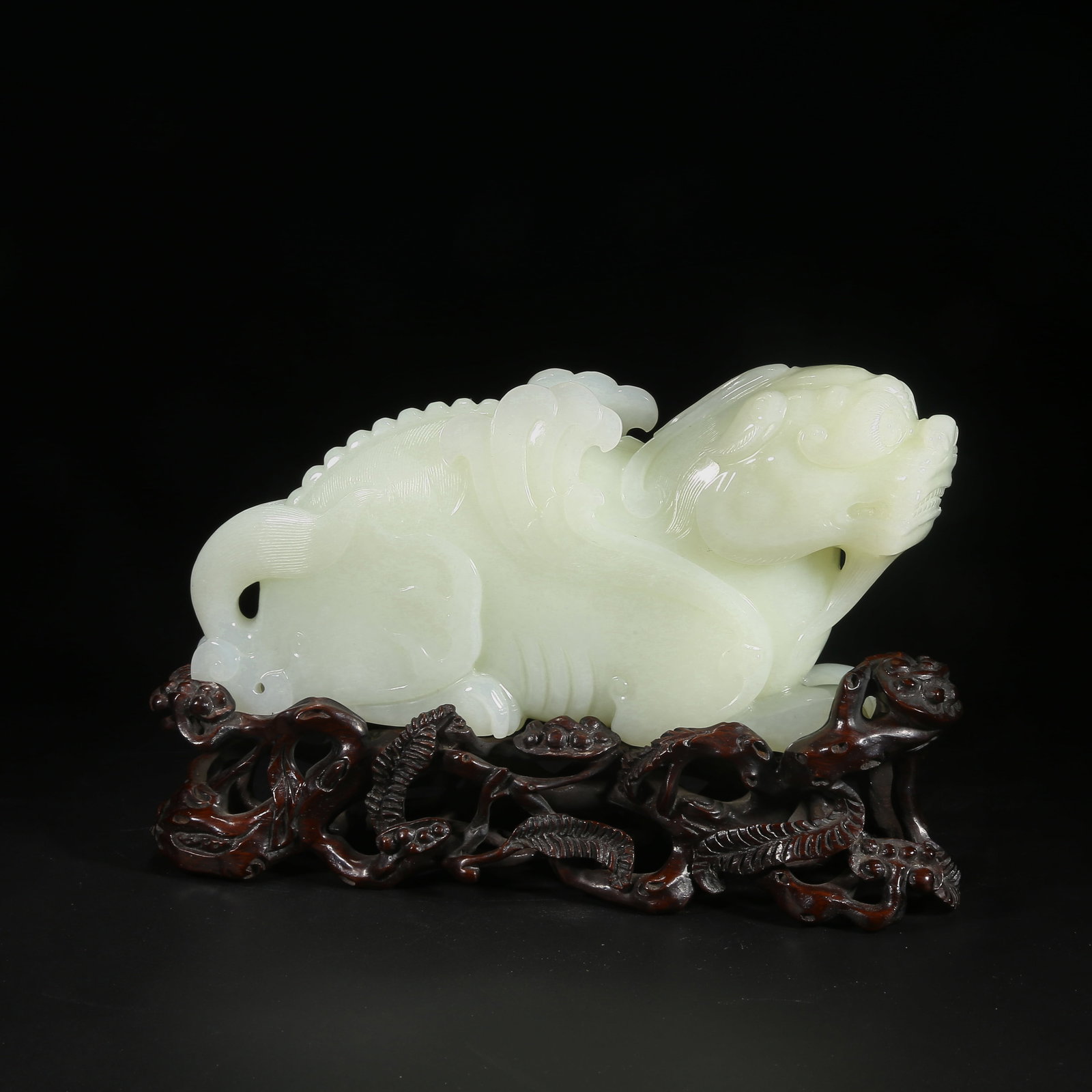 A HETIAN WHITE JADE AUSPICIOUS BEAST ORNAMENT (1 of 7)