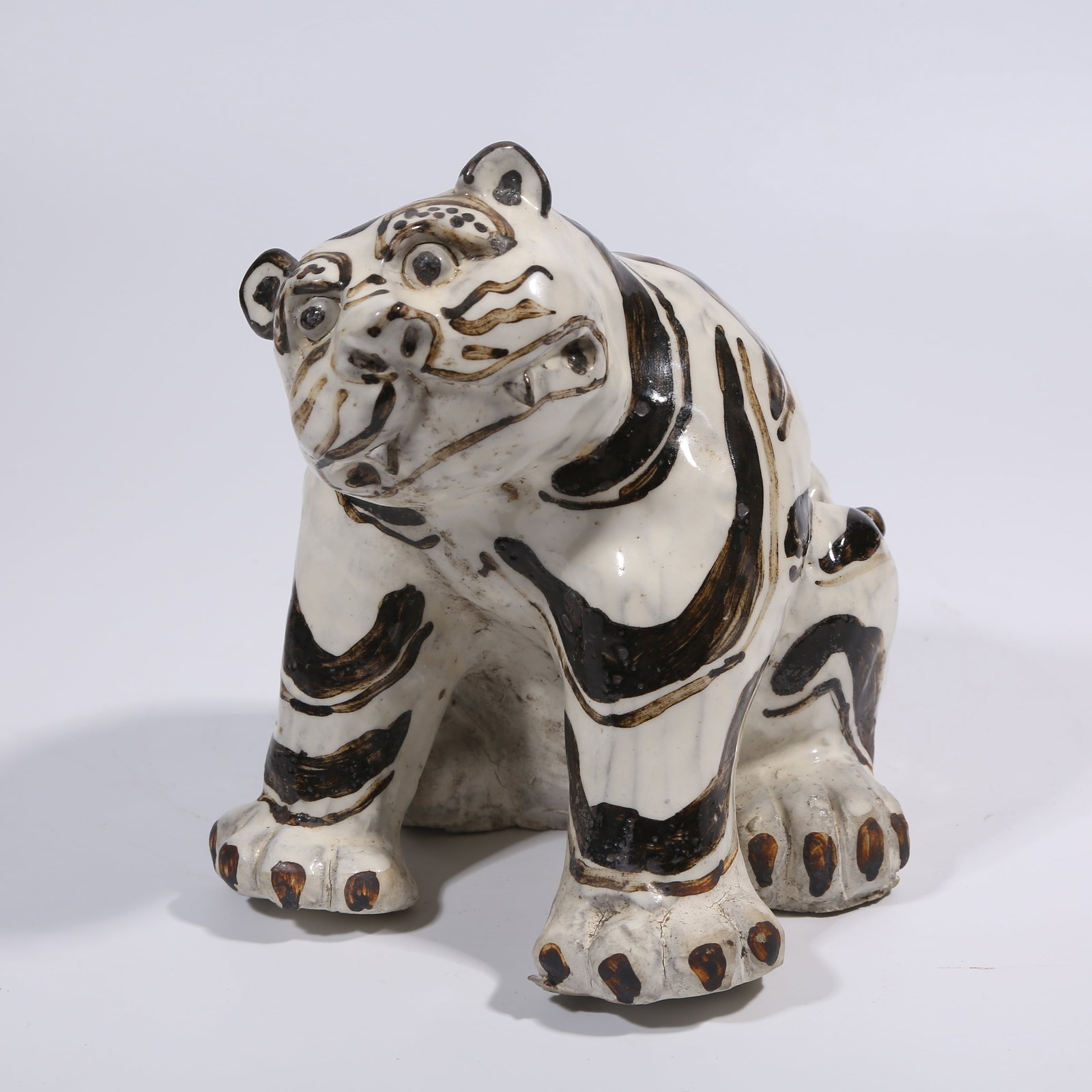 A CIZHOU KILN TIGER FIGURINE (1 of 8)