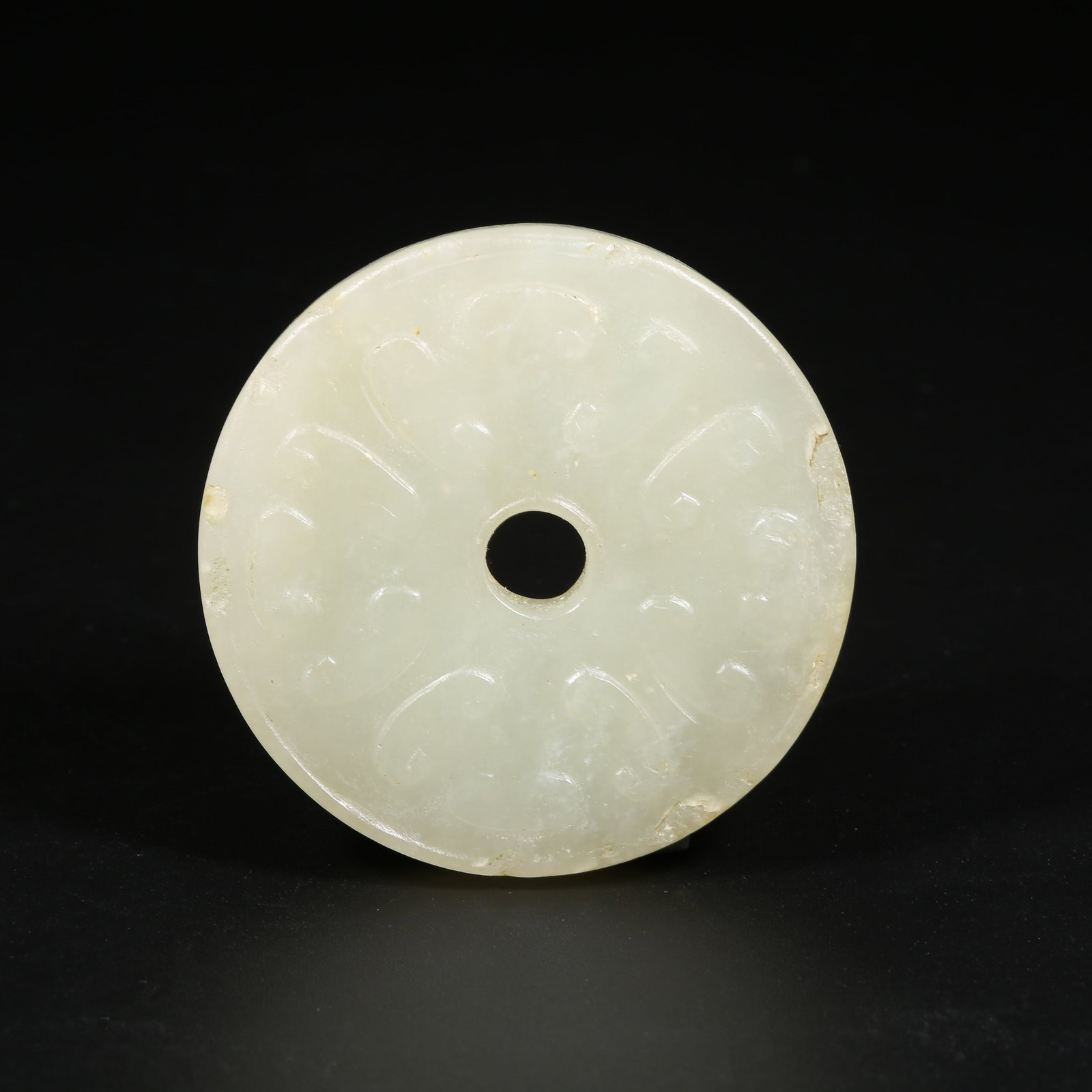 A HETIAN JADE BI DISK WITH CLOUD PATTERN: Hetian Jade Bi Disk with Cloud Pattern