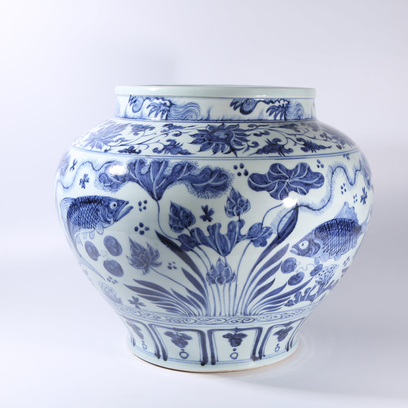 A BLUE-AND-WHITE JAR WITH FISH-AND-ALGAE MOTIF (1 of 9)