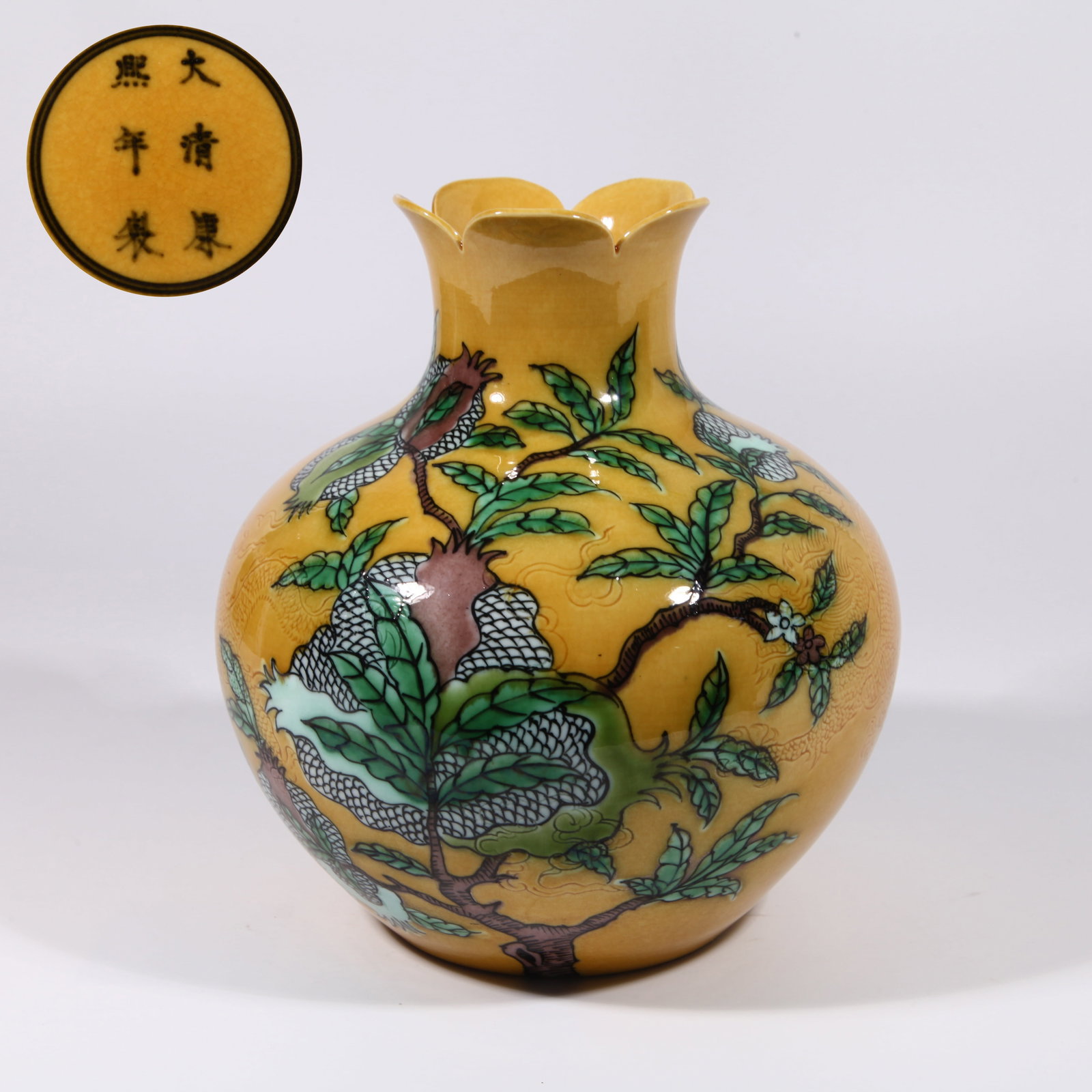 A POMEGRANATE ZUN WITH AUSPICIOUS FRUIT PATTERN IN SANCAI ON YELLOW GROUND (1 of 9)