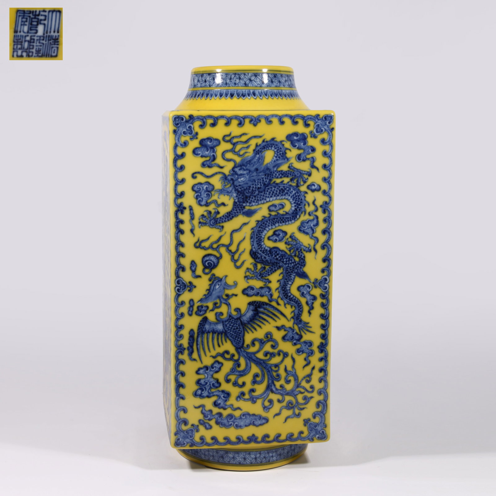 A CONG-SHAPED VASE WITH DRAGON AND PHOENIX PATTERN ON YELLOW GROUND IN UNDERGLAZE BLUE (1 of 10)