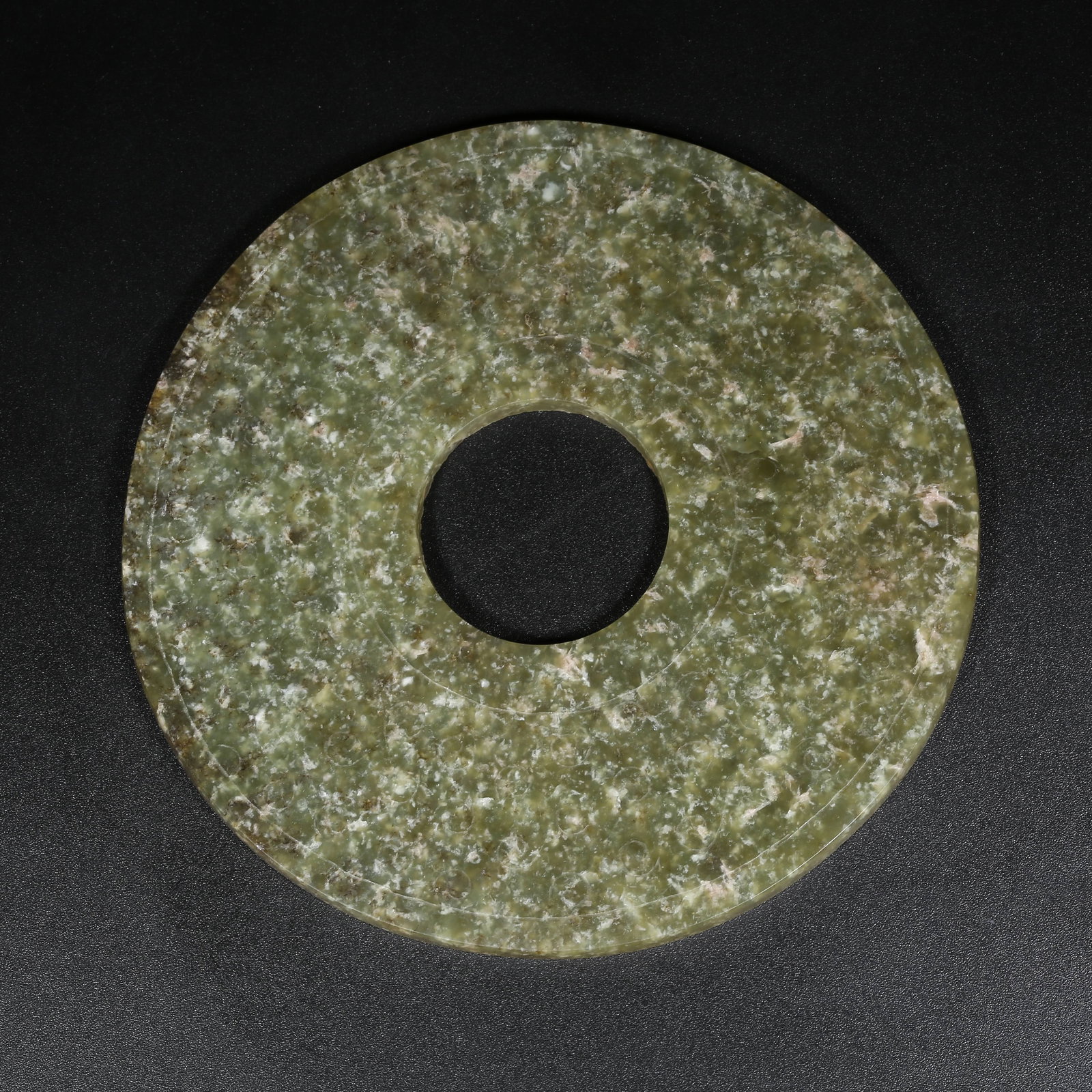 A ANCIENT JADE BI DISK WITH GRAIN PATTERN: Ancient Jade Bi Disk with Grain Pattern