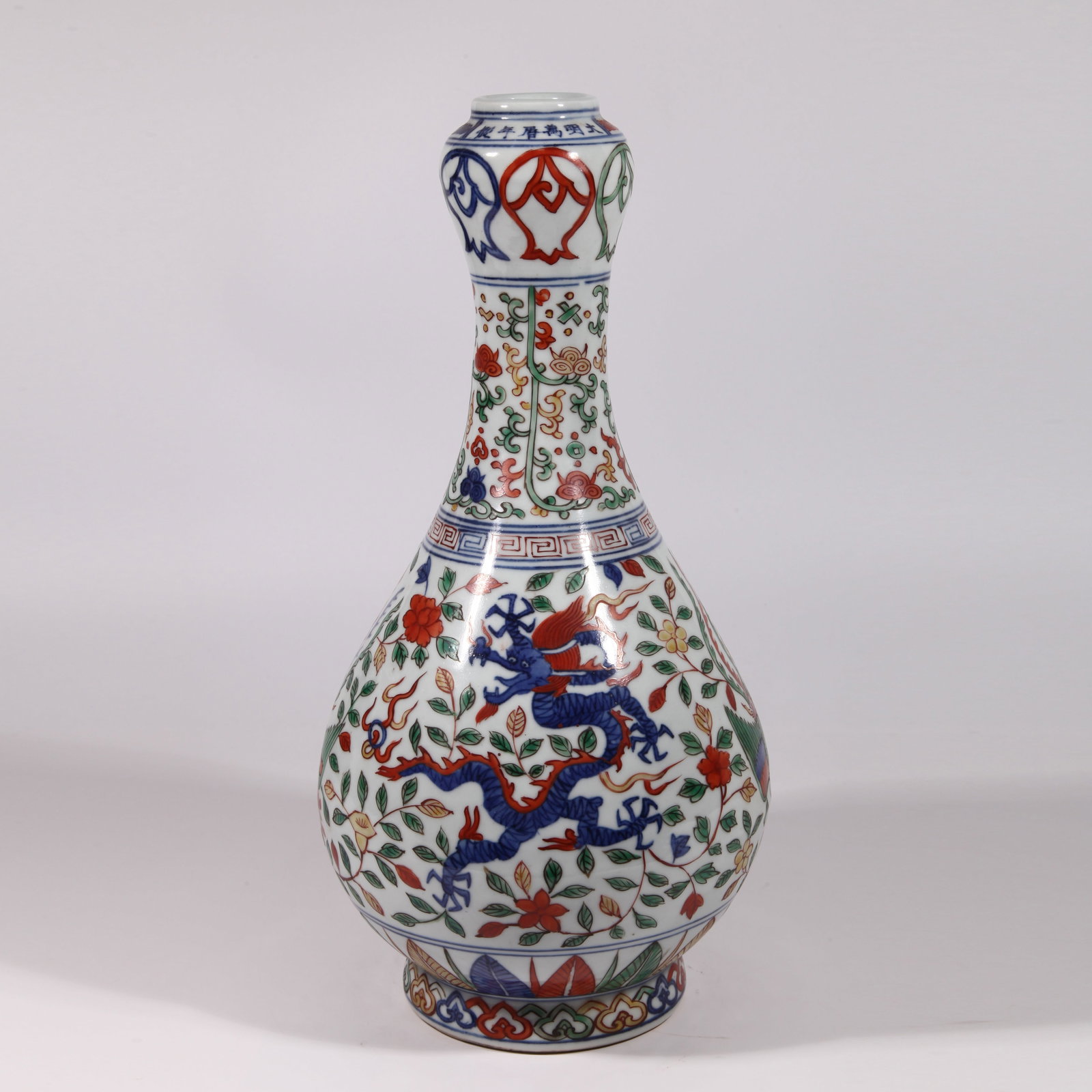 A GARLIC-SHAPED VASE WITH DRAGON AND PHOENIX PATTERN IN WUCAI: Garlic-Shaped Vase with Dragon and Phoenix Pattern in Wucai