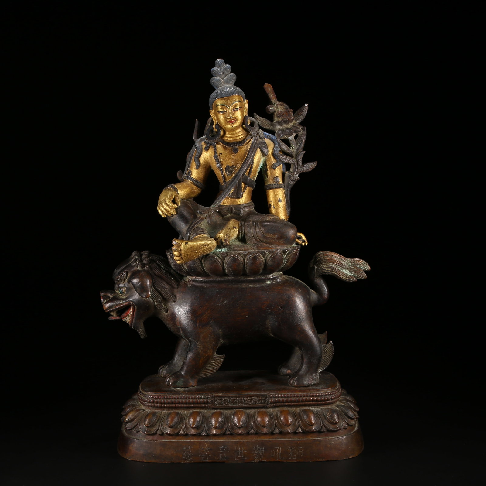 A GILT AND BRONZE ALLOY SIX-TIERED BUDDHIST TOWER STYLE LION'S ROAR AVALOKITESHVARA STATUE: Gilt and Bronze Alloy Six-Tiered Buddhist Tower Style Lion's Roar Avalokiteshvara Statue