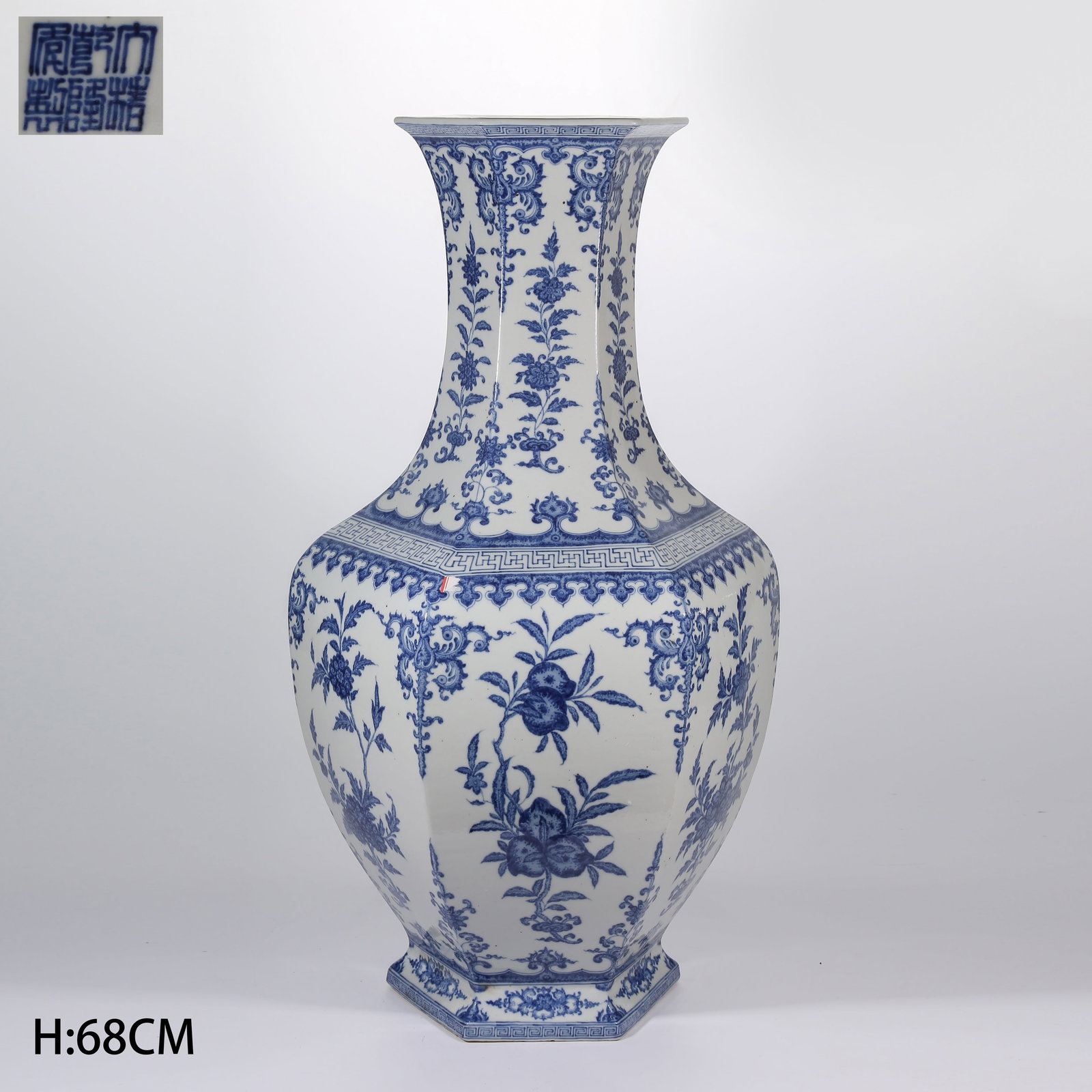 A BLUE-AND-WHITE HEXAGONAL VASE WITH "THREE ABUNDANCES" PATTERN: Blue-and-White Hexagonal Vase with "Three Abundances" Pattern