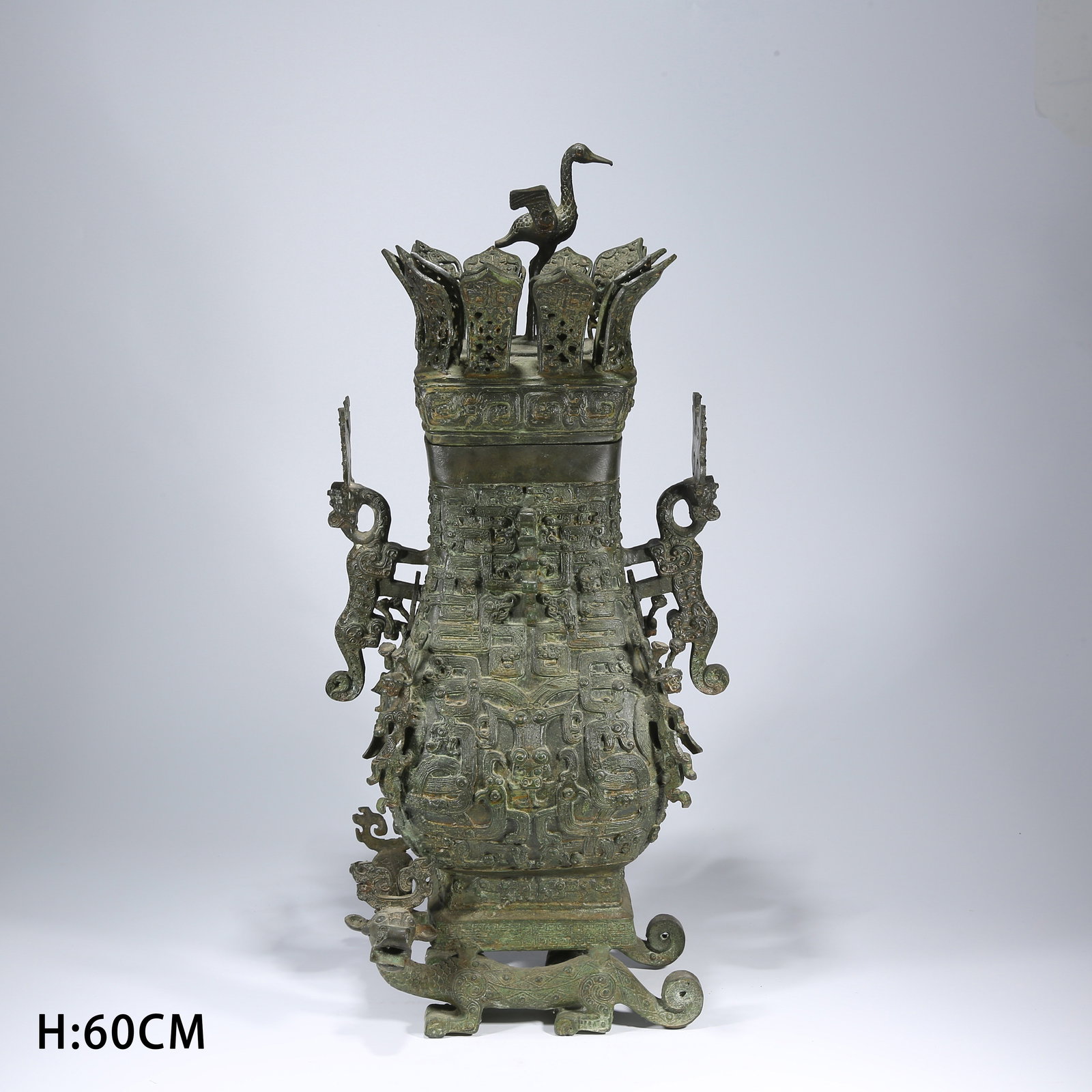 A BRONZE EWER WITH KUI-DRAGON PATTERN AND BEAST HANDLES: Bronze Ewer with Kui-Dragon Pattern and Beast Handles