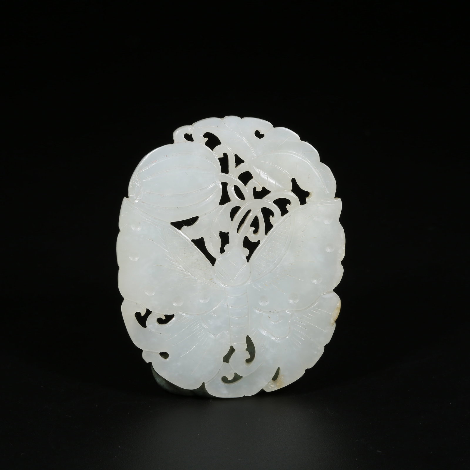 A HETIAN WHITE JADE PENDANT WITH GUA DIE MIAN MIAN MOTIF (1 of 8)