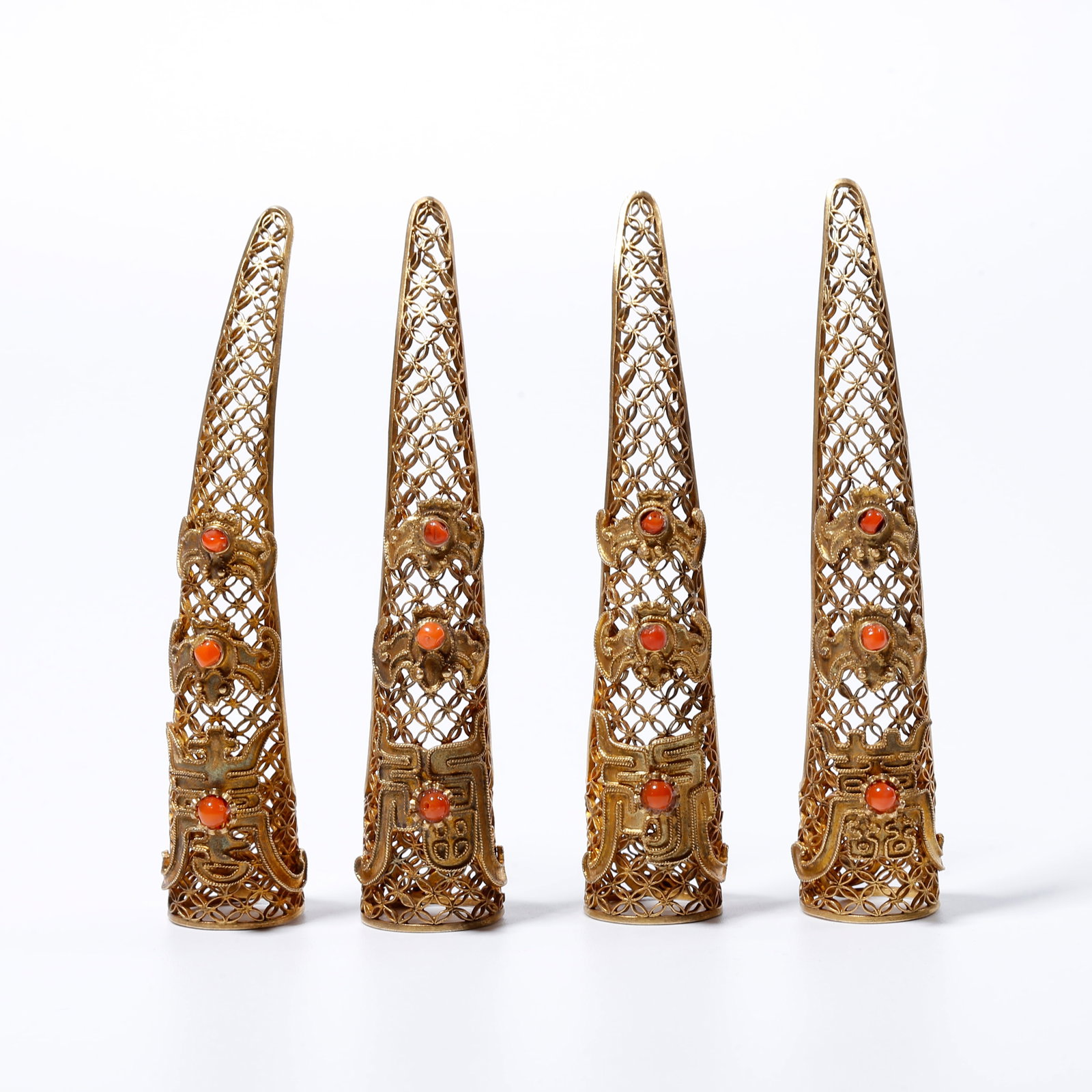 A SILVER GILT NAIL GUARD SET (1 of 9)