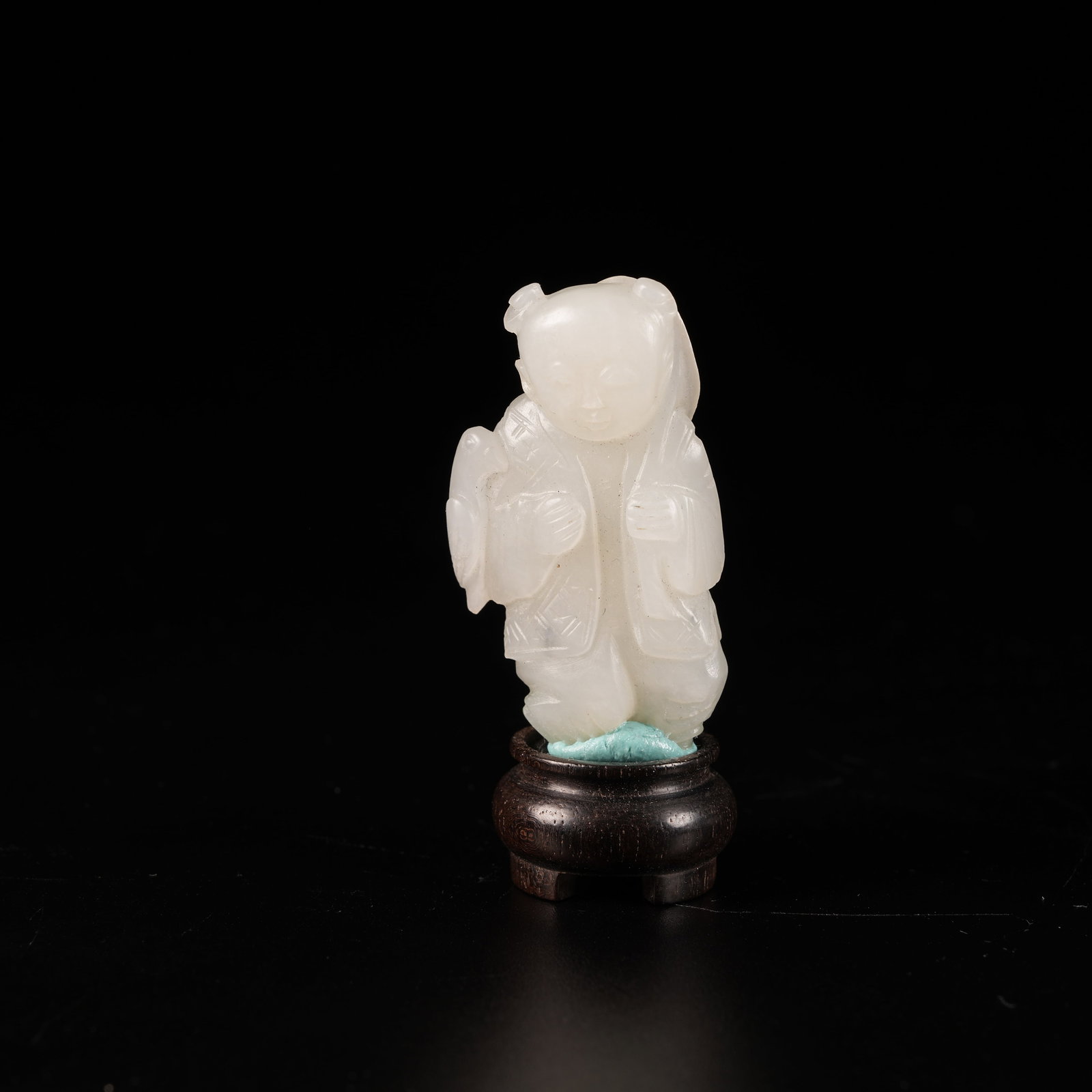 A HETIAN JADE CHILD HOLDING LOTUS ORNAMENT (1 of 8)