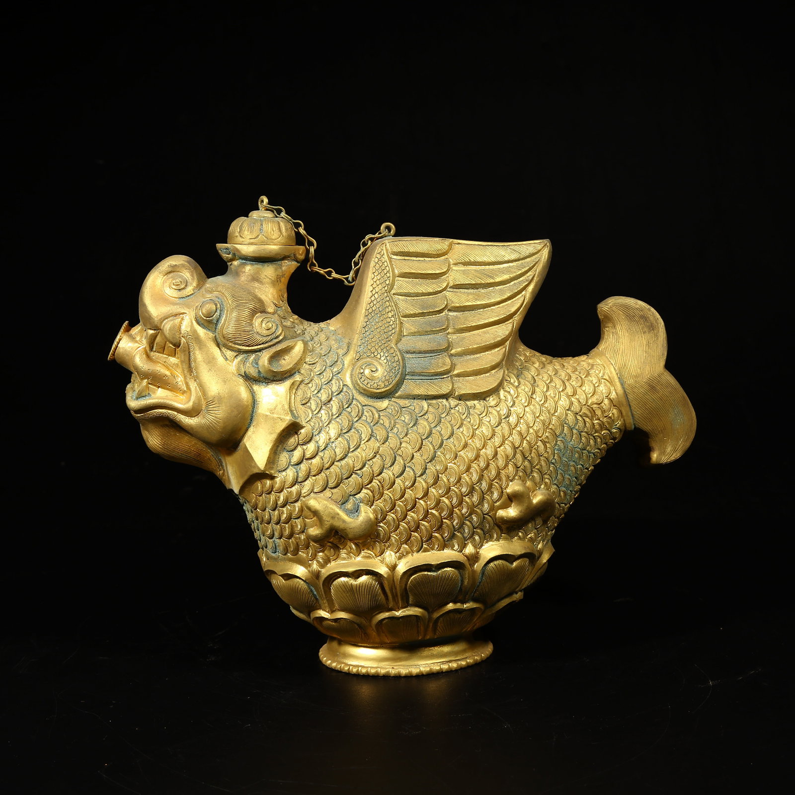 A GILT-BRONZE EWER WITH AUSPICIOUS BEAST DESIGN (1 of 8)