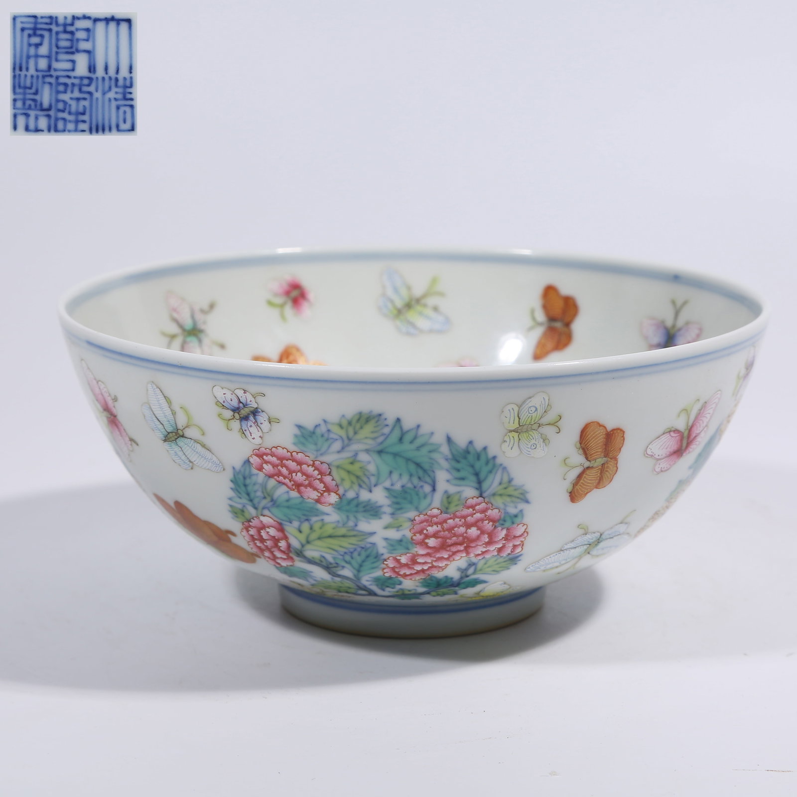 A FAMILLE ROSE BOWL WITH FLOWER AND BUTTERFLY PATTERN (1 of 9)