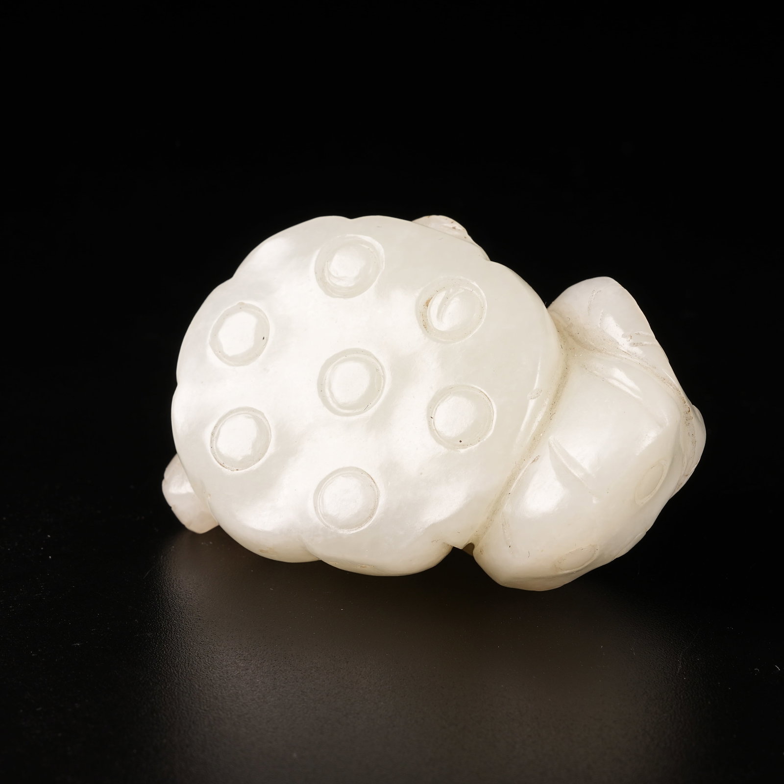 A HETIAN JADE LOTUS SEEDPOD PATTERN PENDANT (1 of 5)