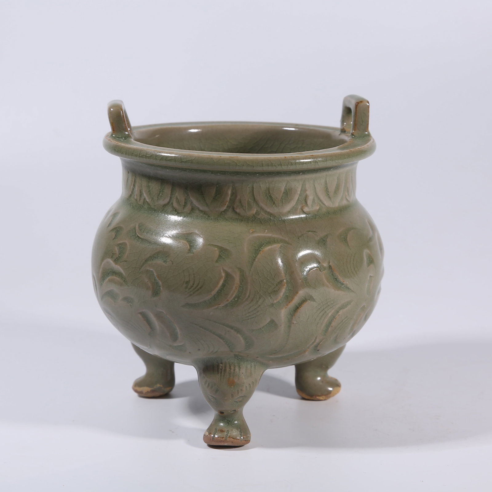 A YAOZHOU WARE CARVED FLORAL CENSER WITH DOUBLE HANDLES AND THREE FEET (1 of 9)