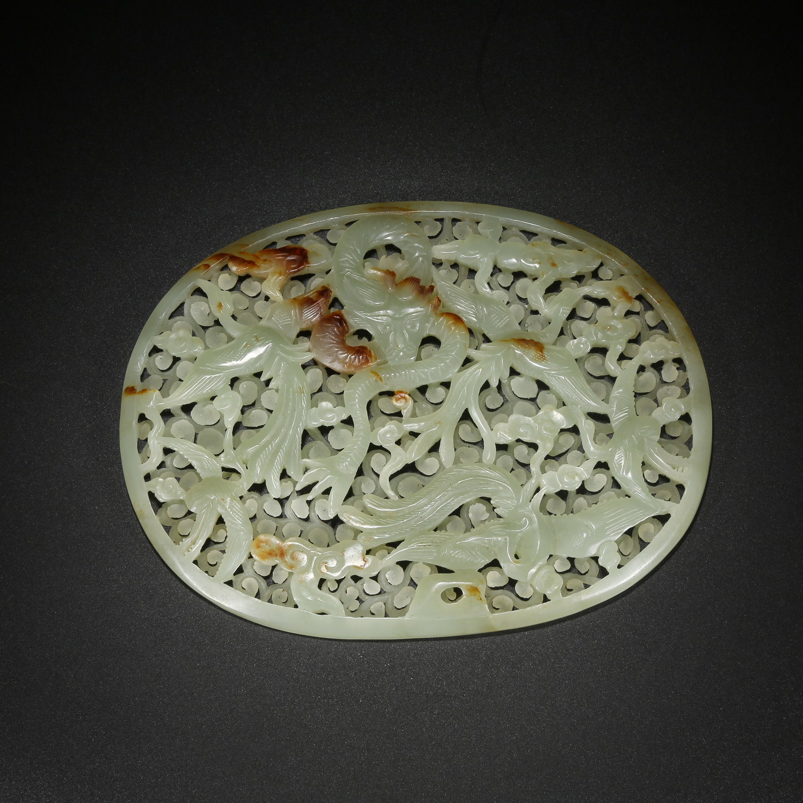 A HETIAN JADE DRAGON PATTERN ORNAMENT (1 of 9)