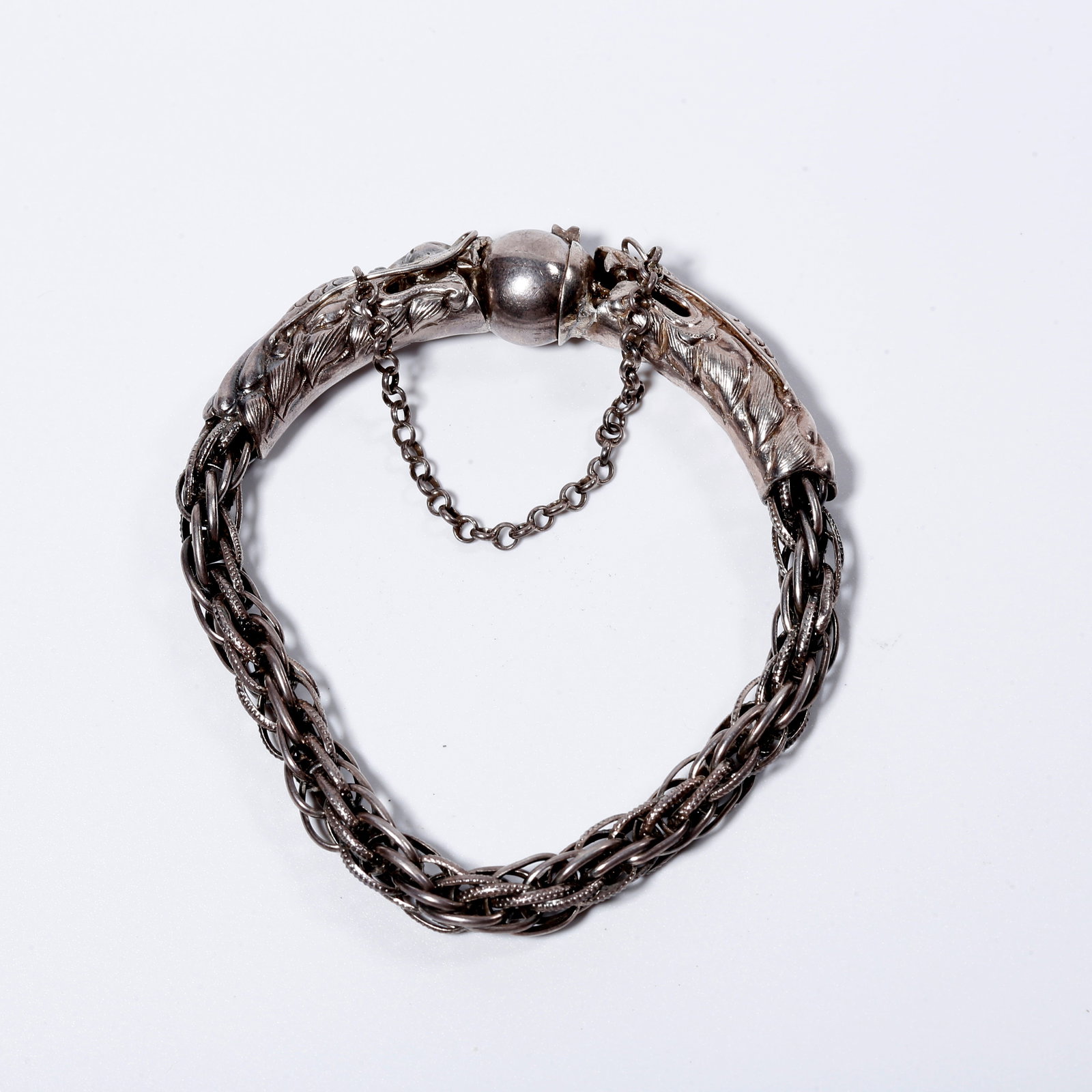 A SILVER DOUBLE DRAGON PLAYING WITH PEARL BRACELET (1 of 10)