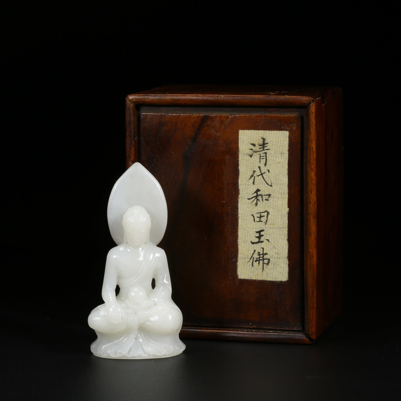 A HETIAN JADE BUDDHA STATUE (1 of 8)