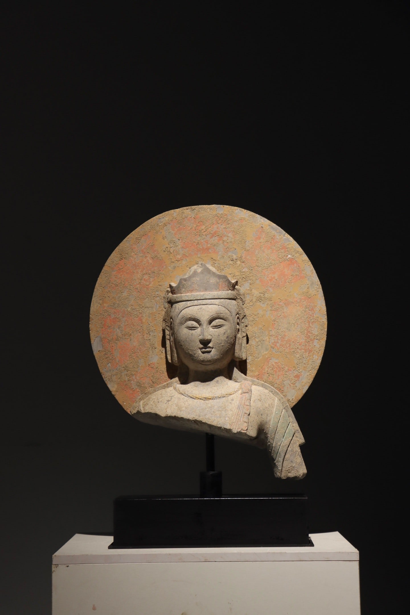 A SUI-DYNASTY HALF-FIGURE STATUE (1 of 8)
