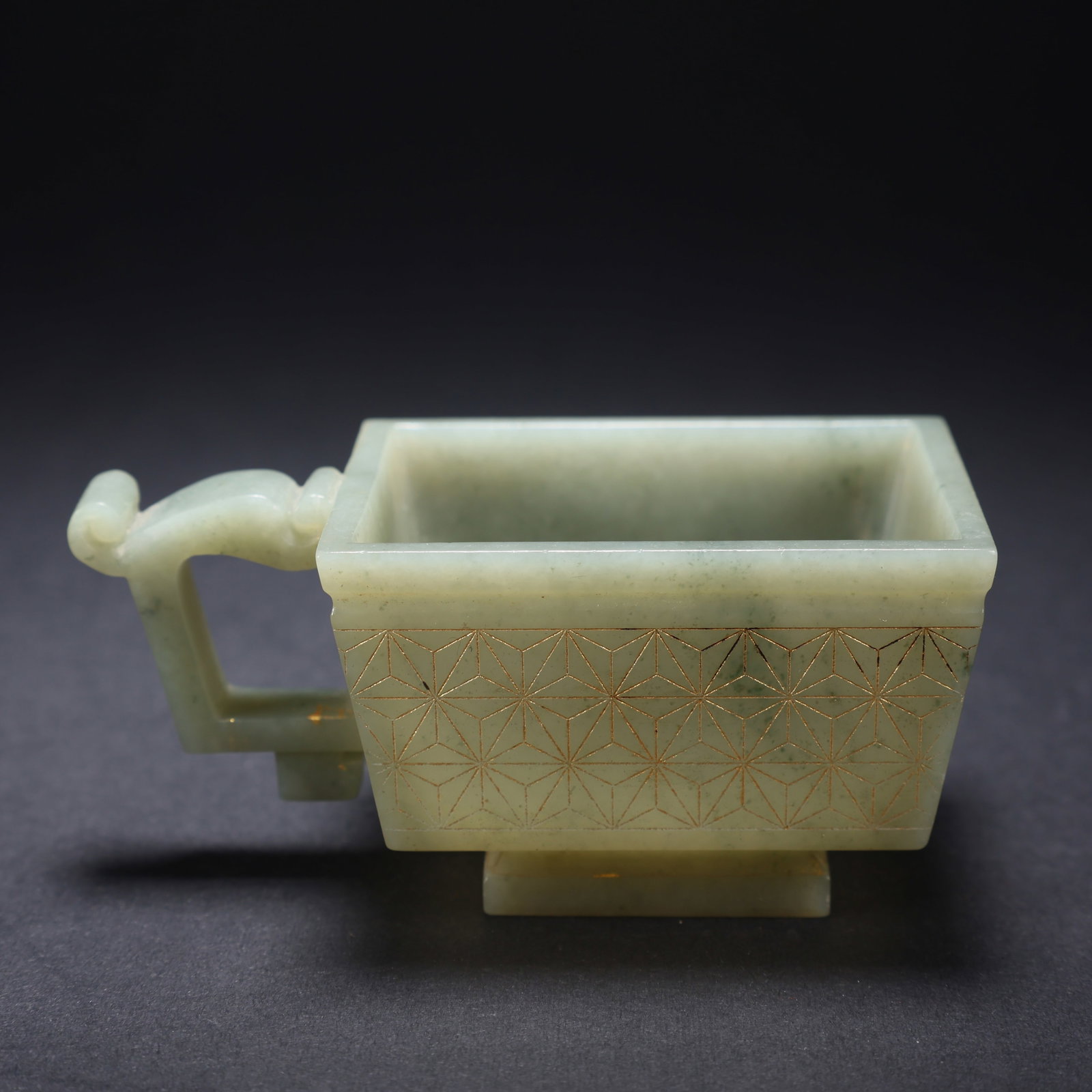 A HETIAN JADE SQUARE-MOUTHED CUP WITH HANDLE, PAINTED AND GILDED (1 of 9)