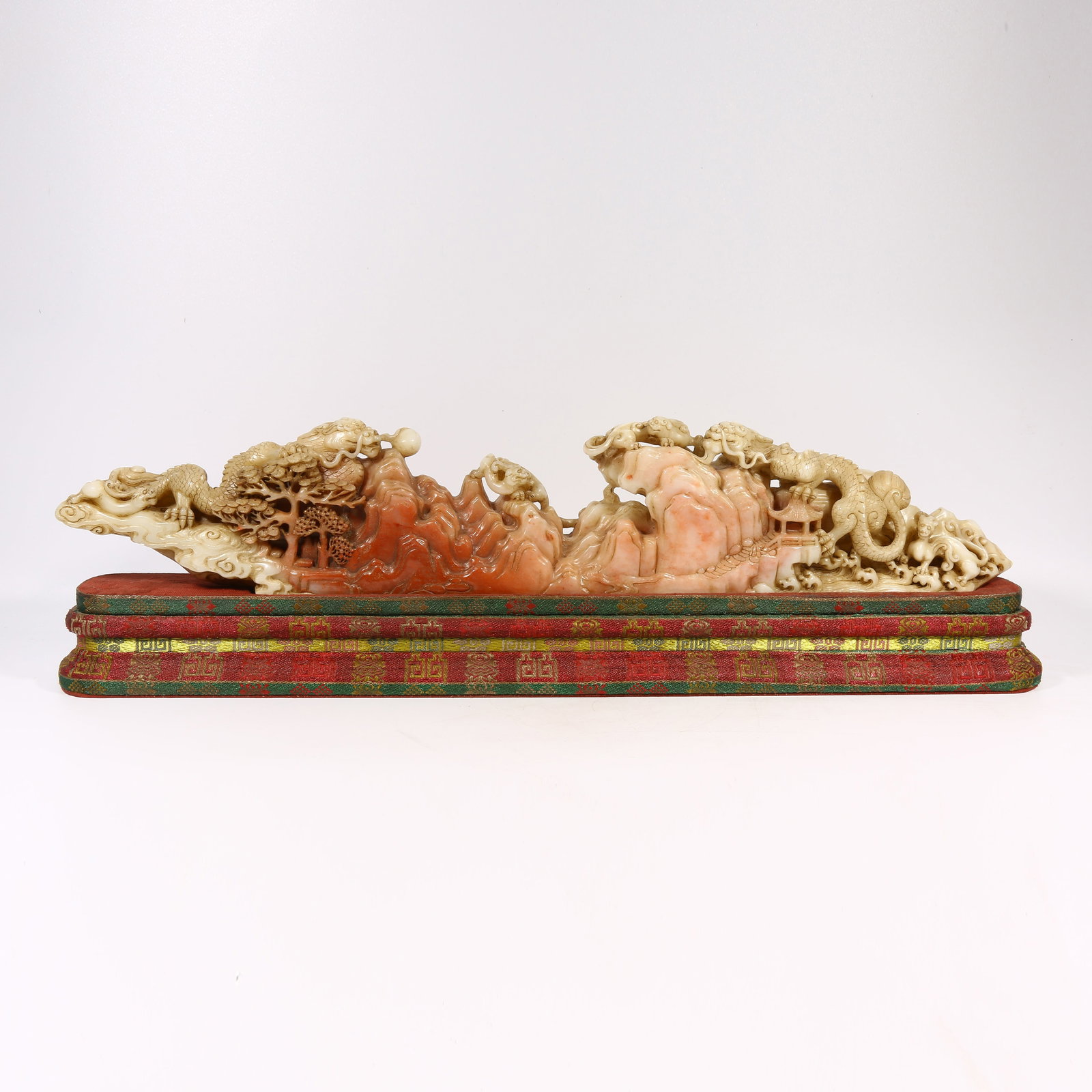 A SHOUSHAN STONE MINIATURE MOUNTAIN WITH DRAGON DESIGN: Shoushan stone miniature mountain with dragon design