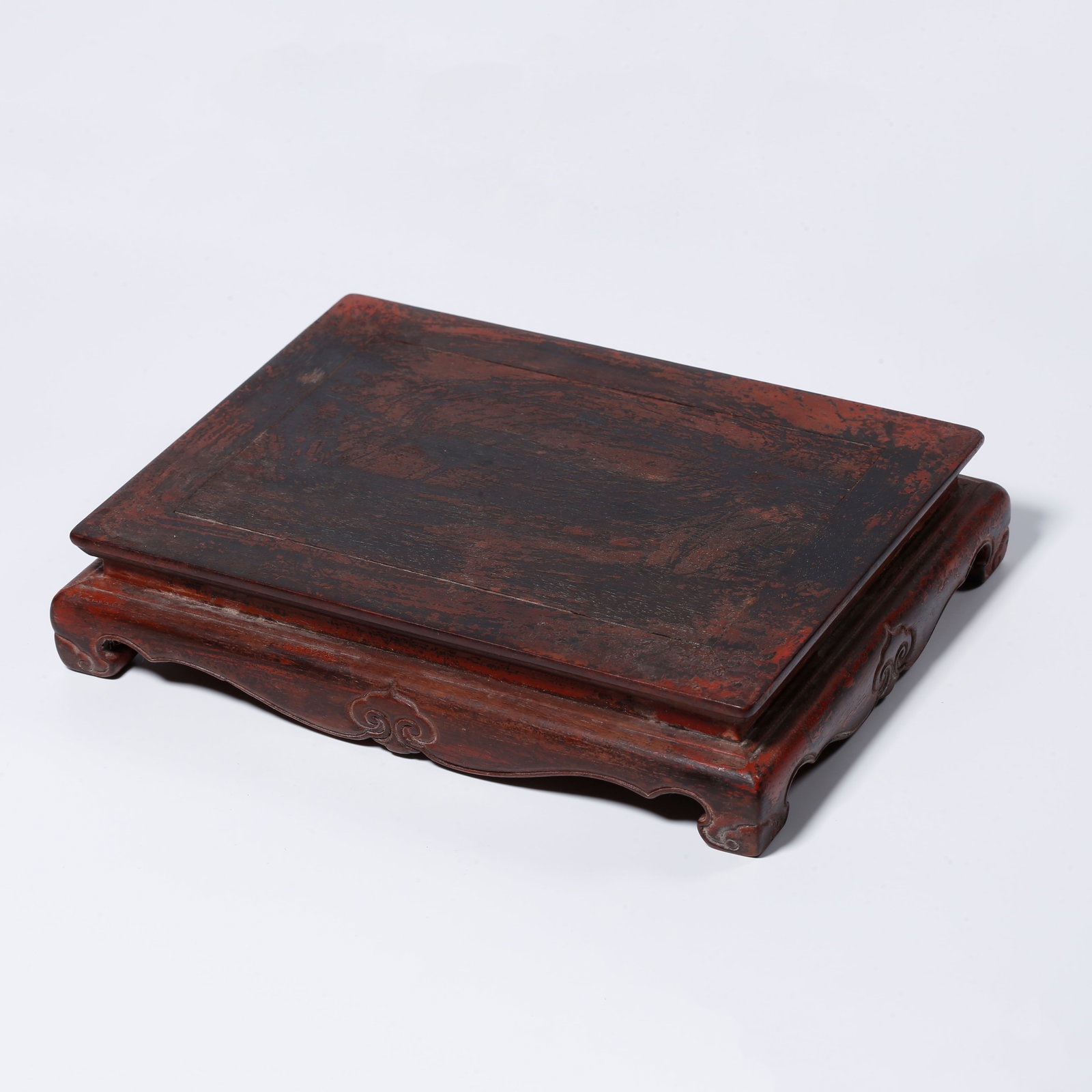 A WOODEN BASE: Wooden base