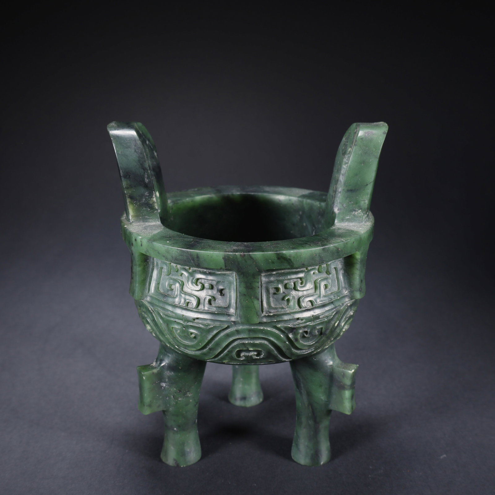 A HETIAN JASPER TRIPOD DOUBLE-HANDLED DING: Hetian Jasper Tripod Double-Handled Ding