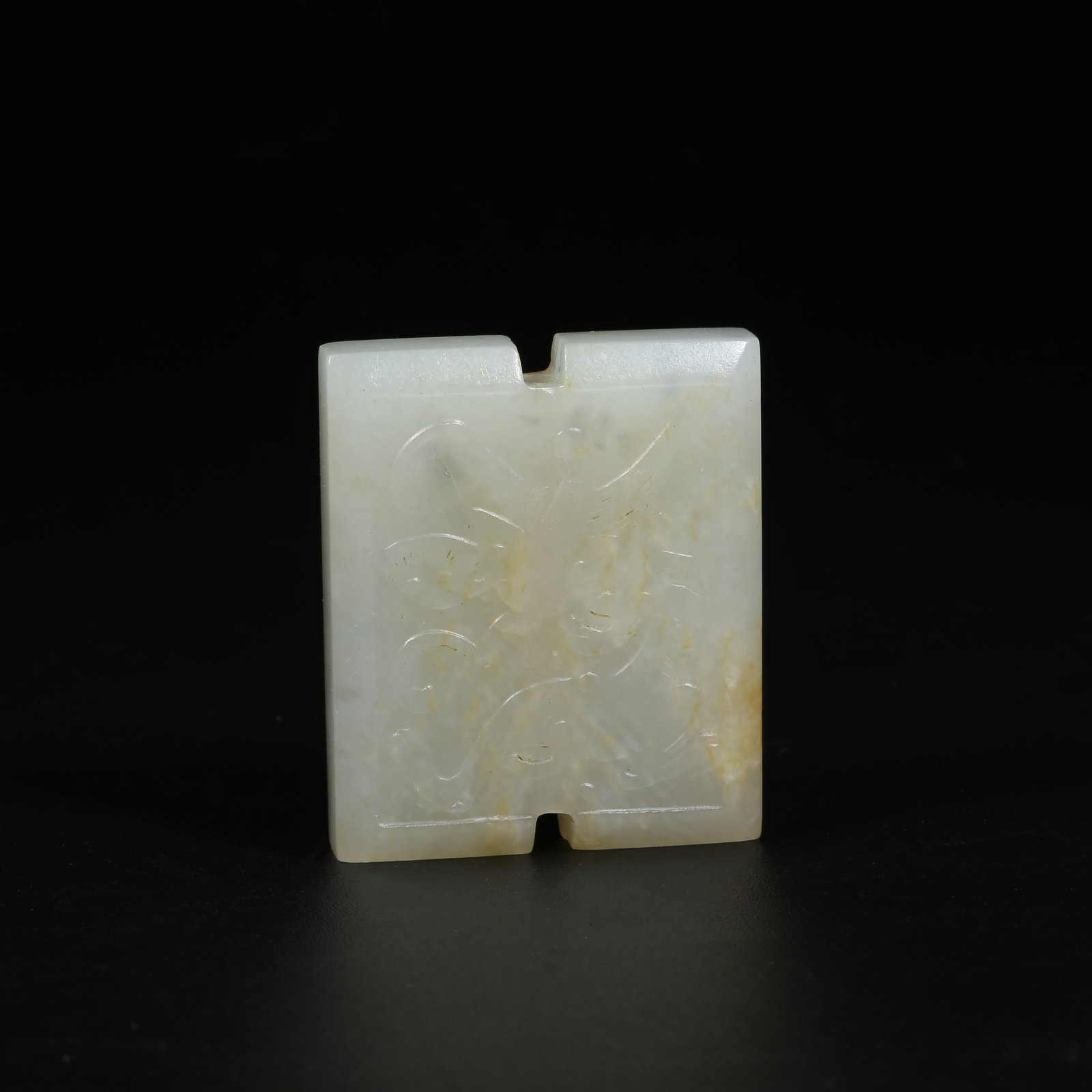 A HETIAN WHITE JADE GONG-SHAPED PENDANT WITH CHI-DRAGON MOTIF (1 of 8)