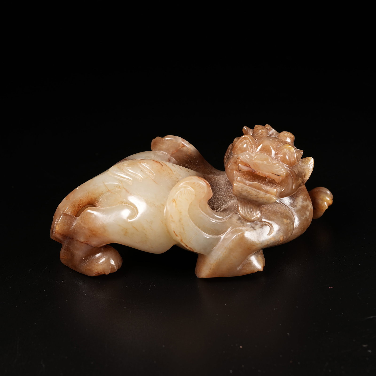 A ANCIENT JADE AUSPICIOUS BEAST ORNAMENT (1 of 8)