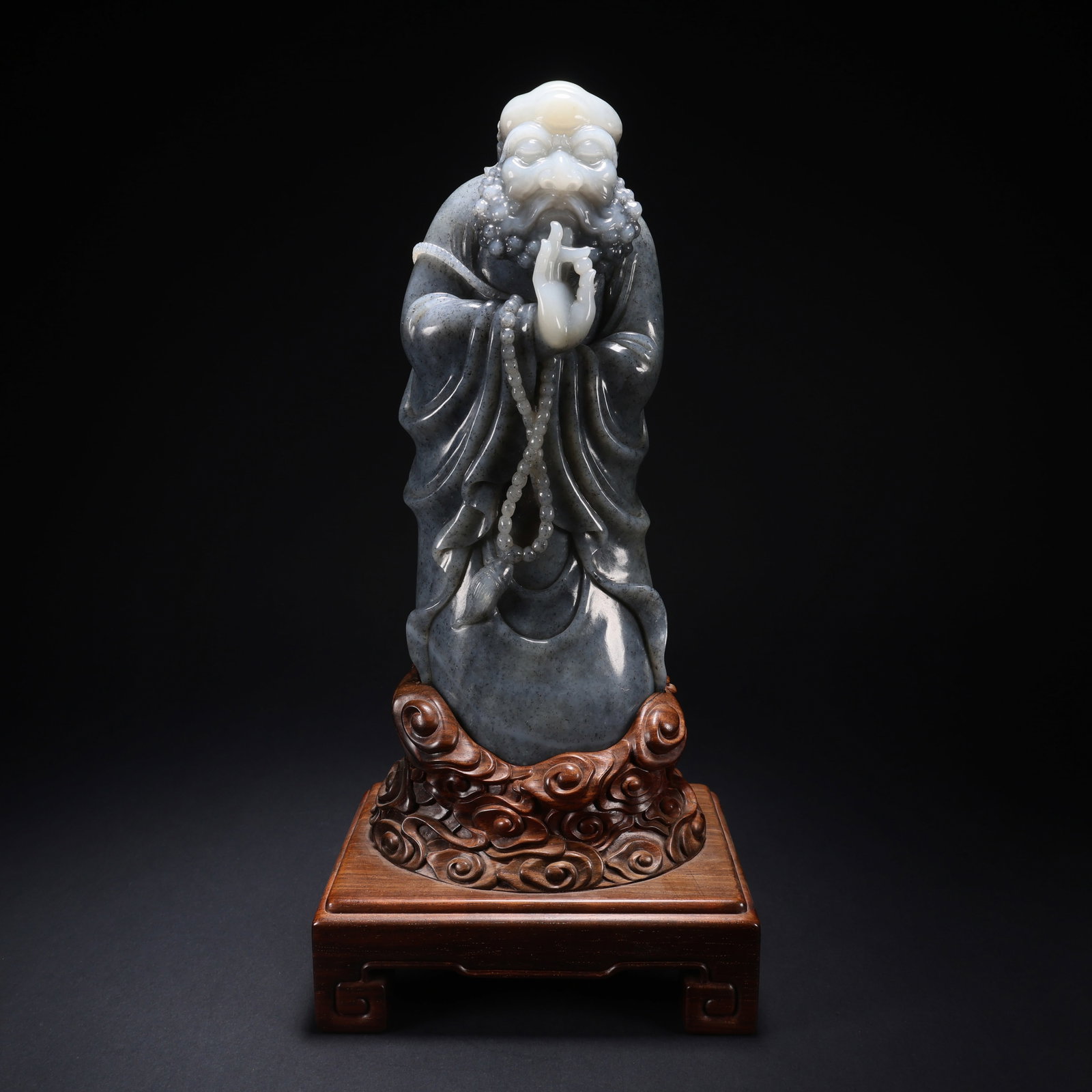 A HETIAN JADE DARUMA ON WOODEN BASE (1 of 9)