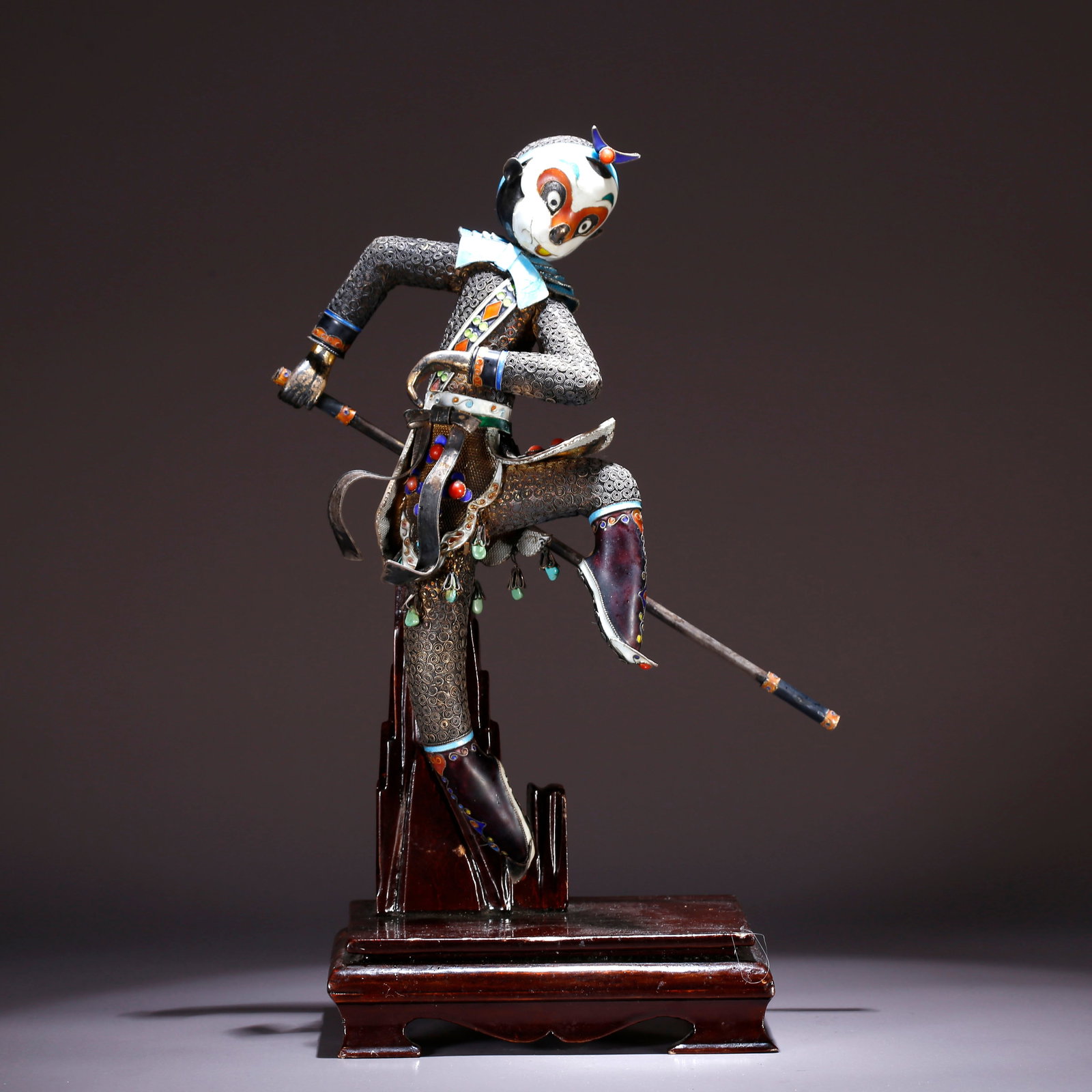 A SILVER-PAINTED FIGURE OF SUN WUKONG ORNAMENT (1 of 9)