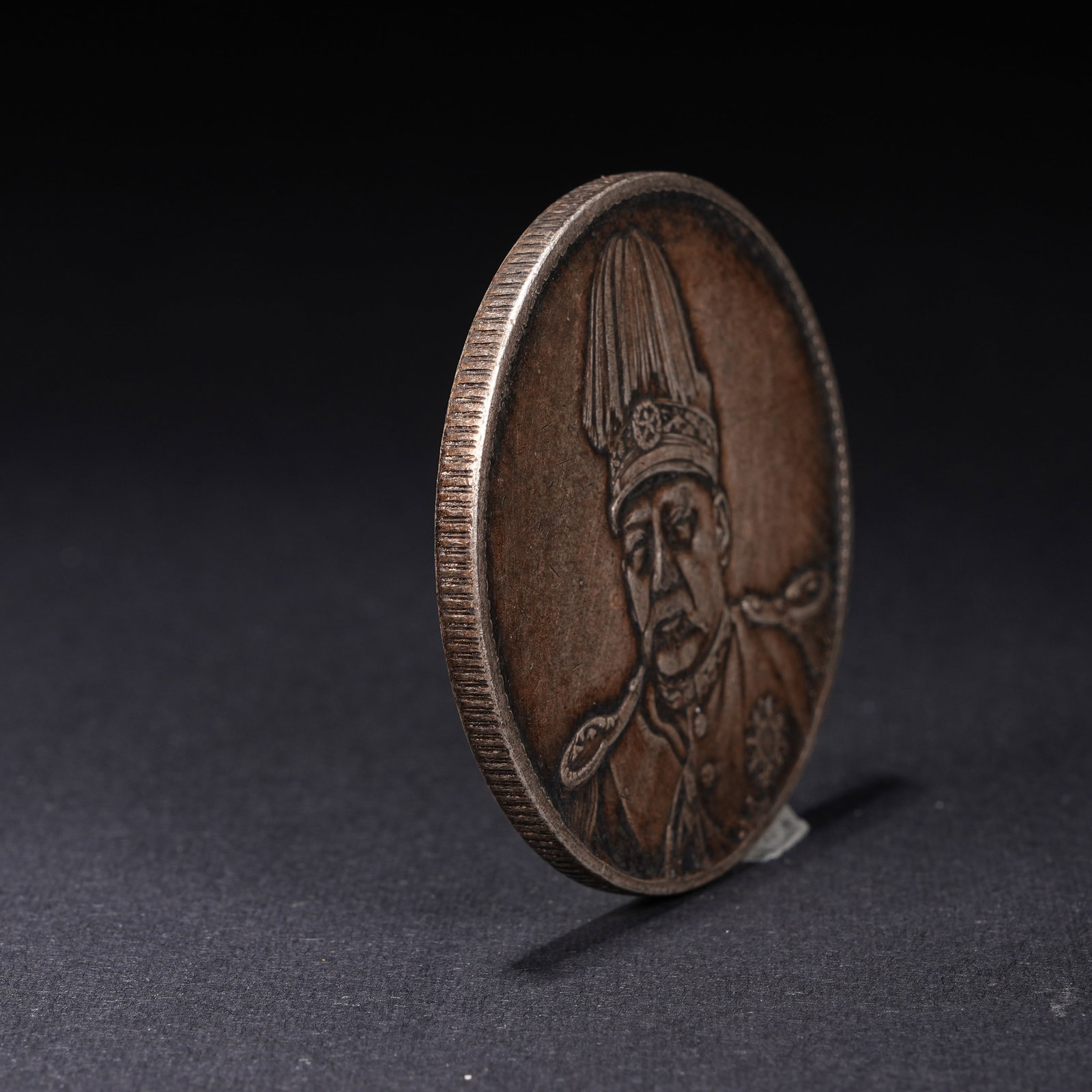 A SILVER DOLLAR COIN - 2