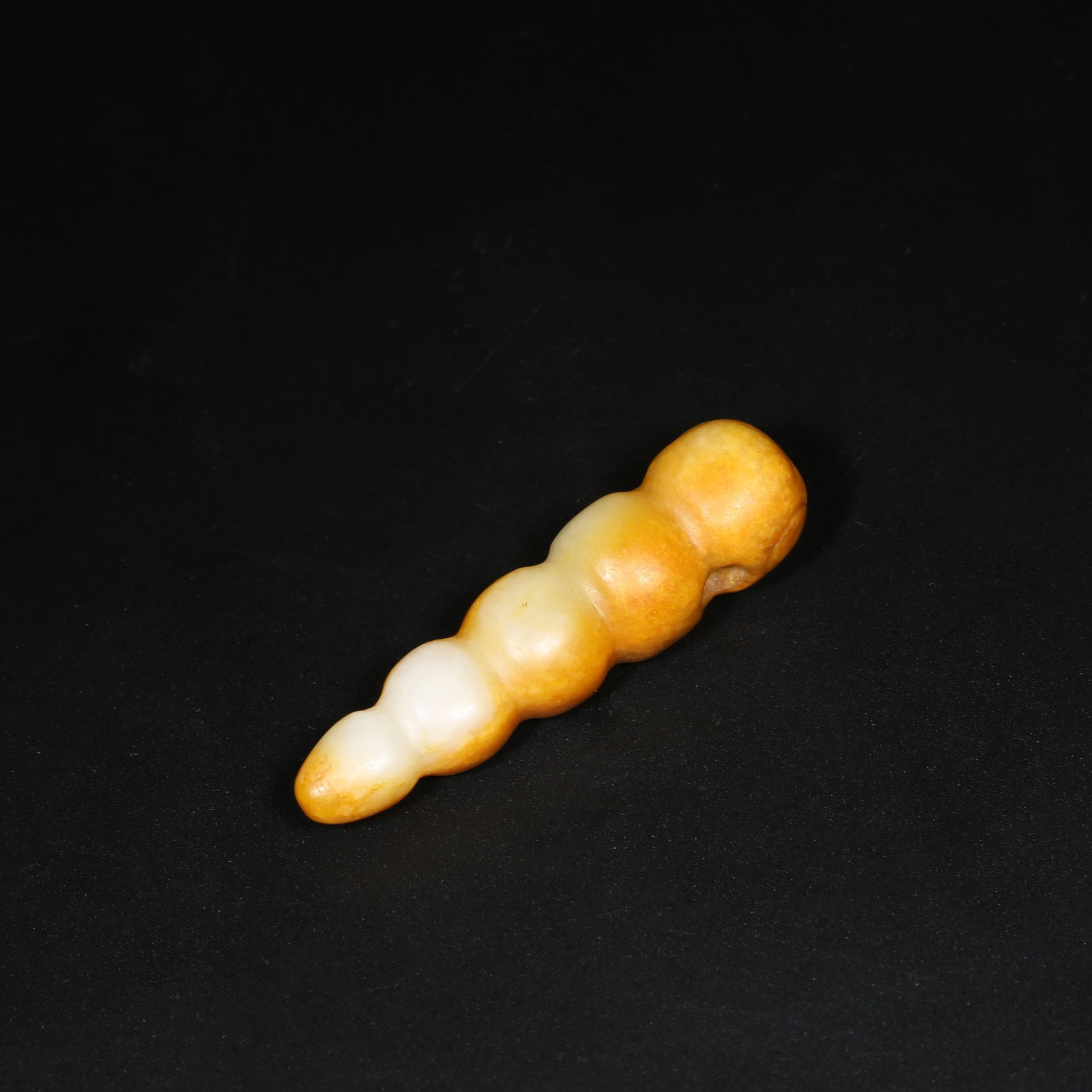 A ARCHAIC JADE SILKWORM PUPAE: Archaic Jade Silkworm Pupae