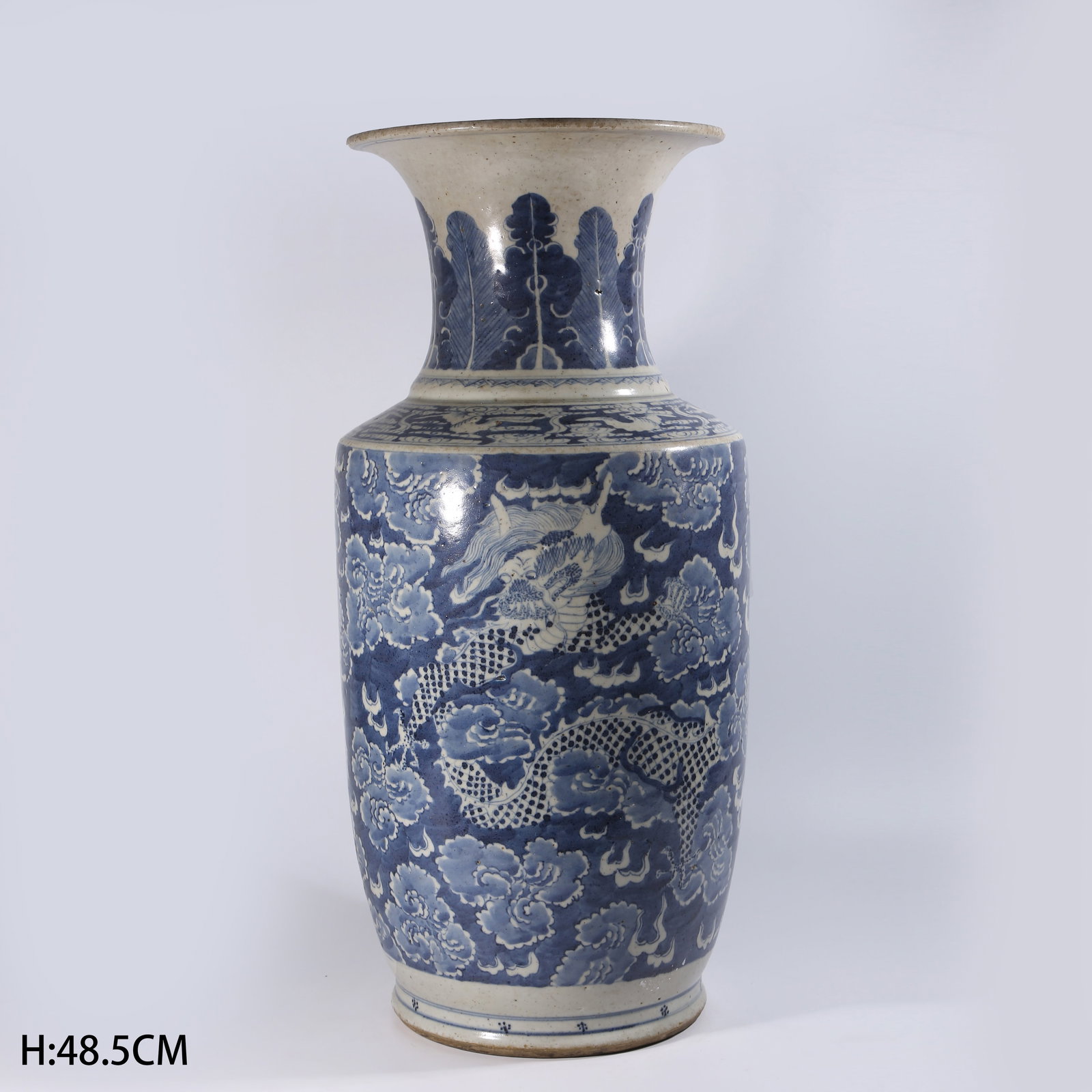 A BLUE-AND-WHITE OPENWORK CLOUD-PIERCING QILIN PATTERN WIDE-MOUTH VASE: Blue-and-White Openwork Cloud-Piercing Qilin Pattern Wide-Mouth Vase