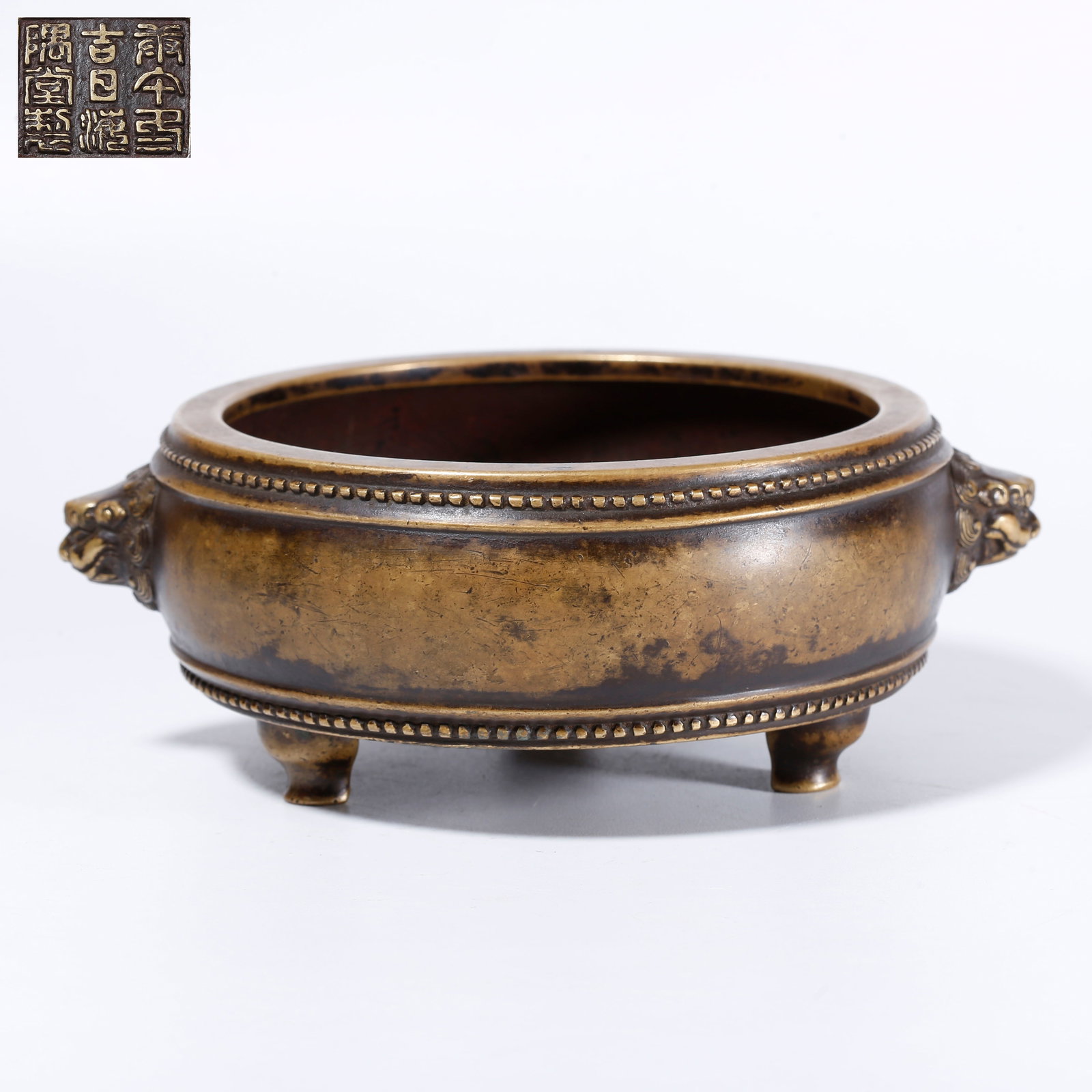 A BRONZE CENSER WITH DOUBLE BEAST-HEAD HANDLES (1 of 10)