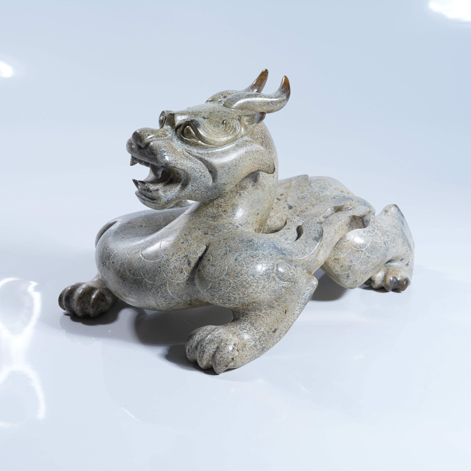 A ANCIENT JADE COILED DRAGON ORNAMENT: Ancient Jade Coiled Dragon Ornament