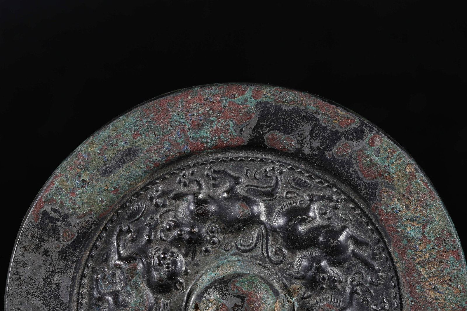 A BRONZE MIRROR - 2