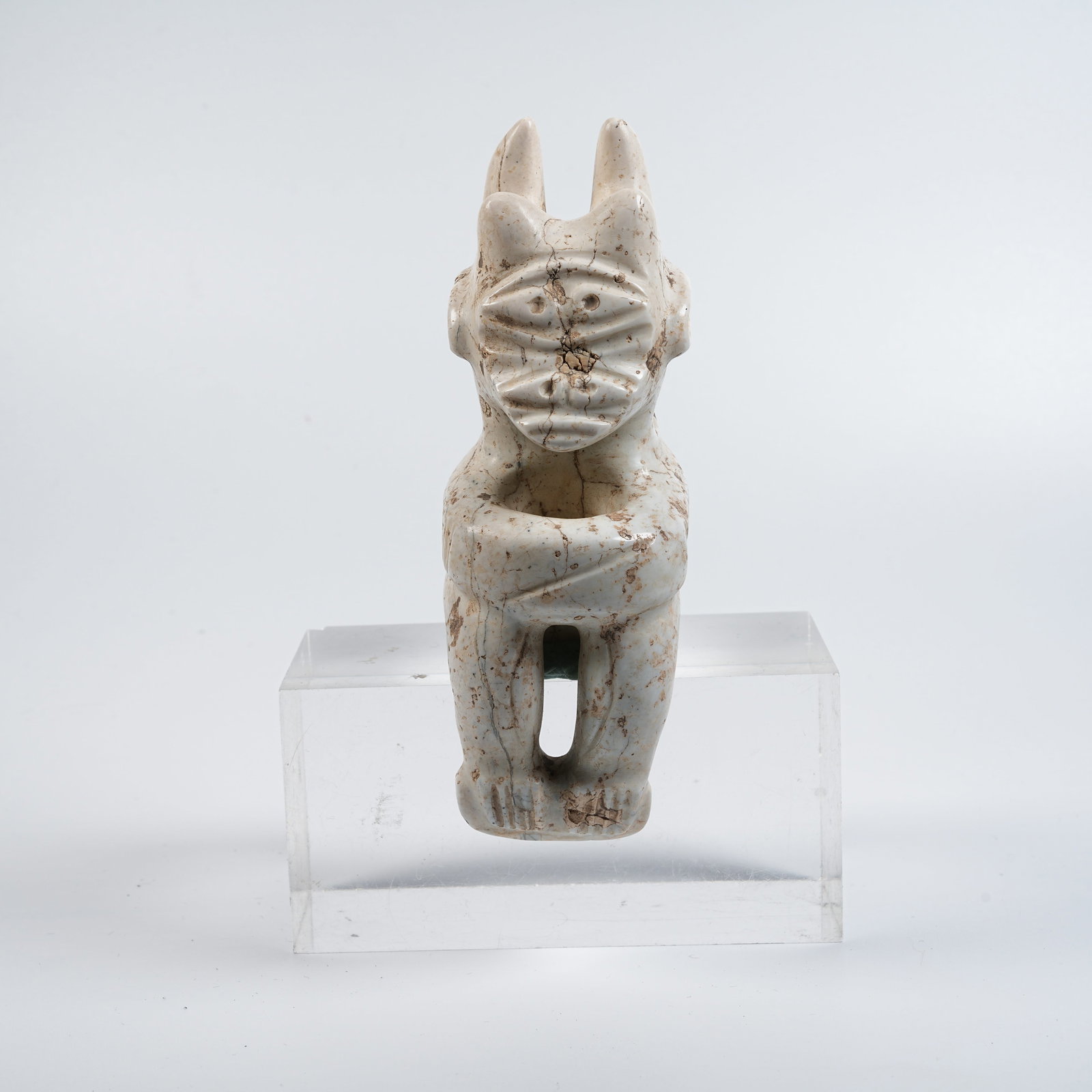 A HONGSHAN CULTURE ARCHAIC JADE SUN DEITY PENDANT: Hongshan Culture archaic jade sun deity pendant