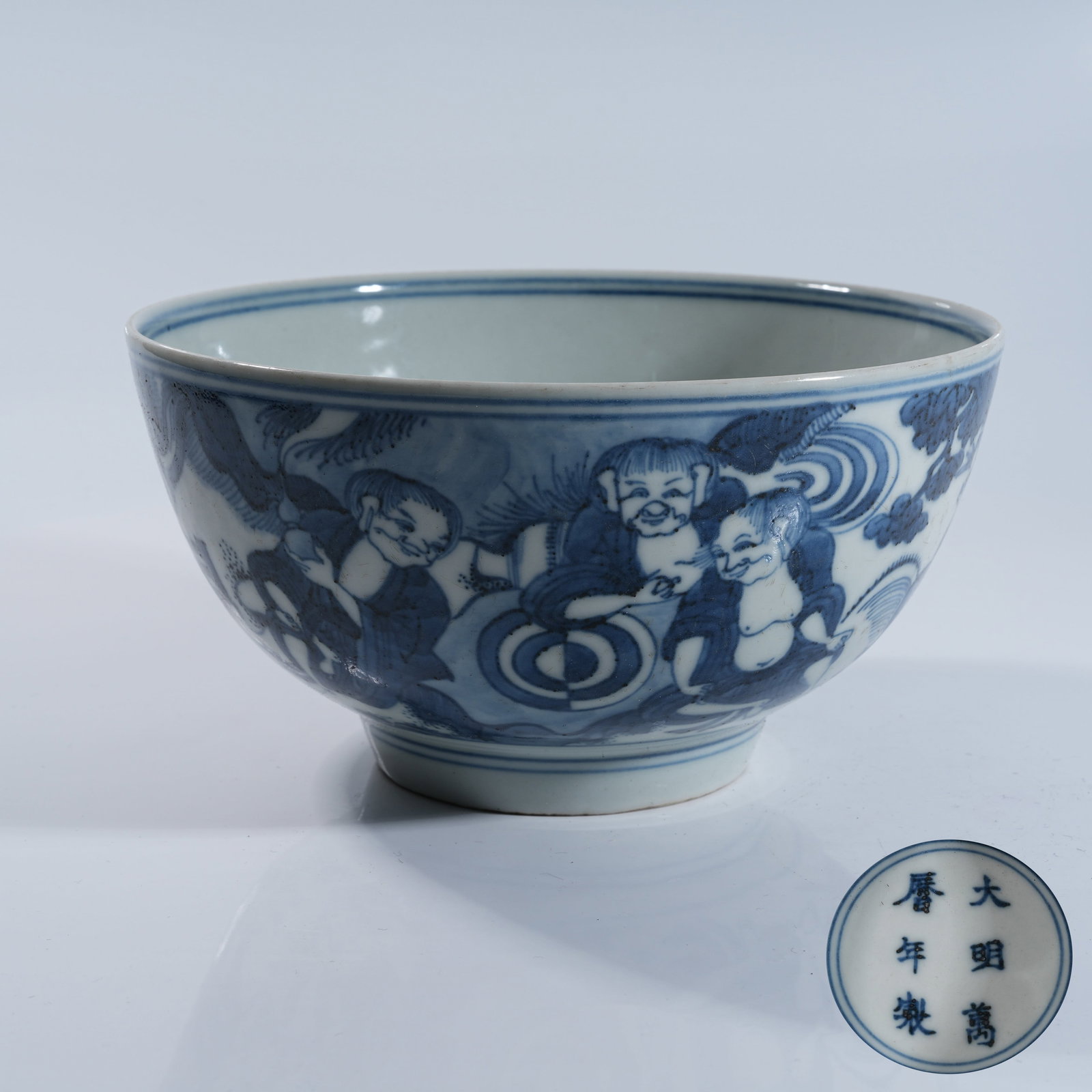A BLUE AND WHITE BOWL WITH SCHOLARS UNDER PINE DESIGN: Blue and White Bowl with Scholars Under Pine Design