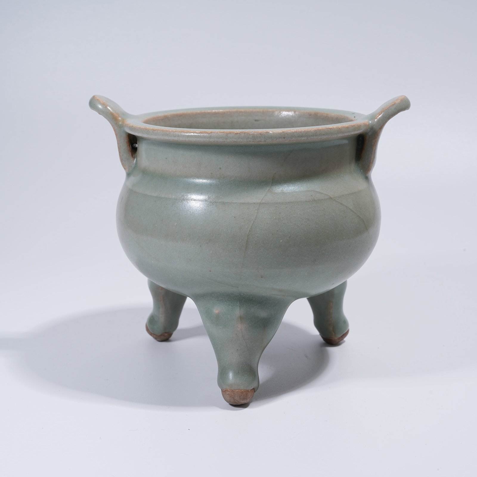 A LONGQUAN KILN COURT HAT EAR CENSER: Longquan Kiln Court Hat Ear Censer