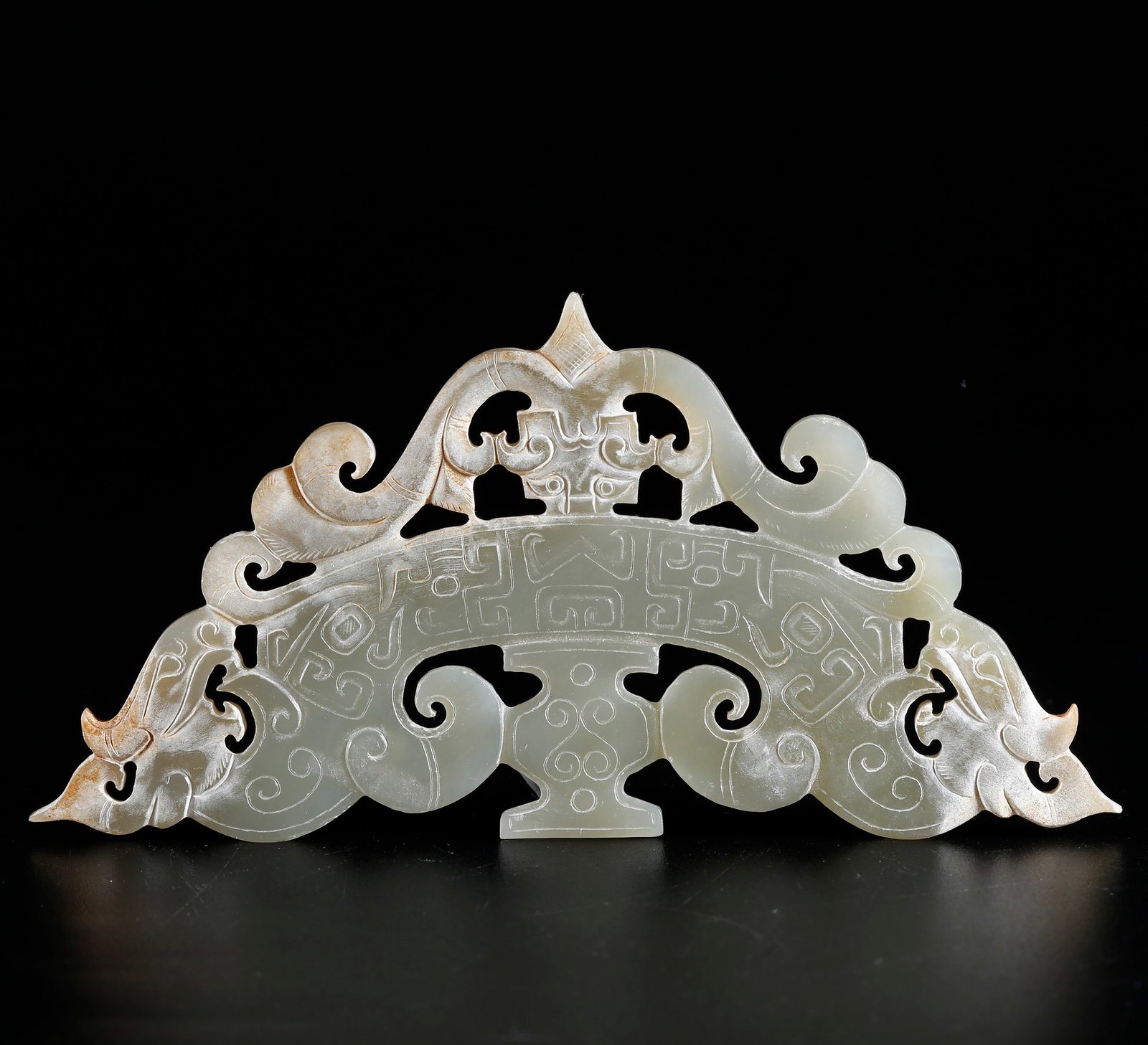 A HETIAN JADE HUANG PENDANT CARVED WITH BEAST FACE PATTERN (1 of 9)