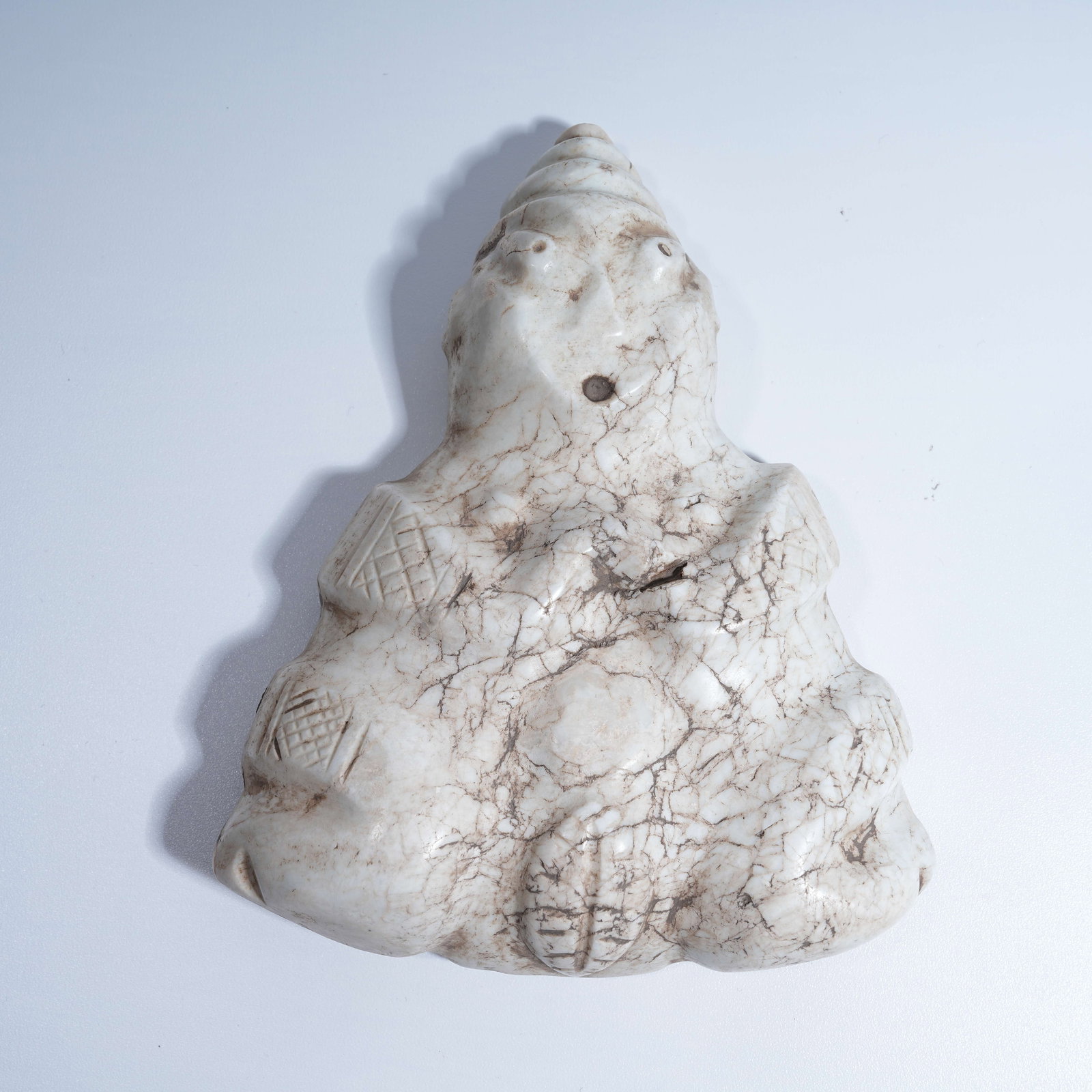 A HONGSHAN CULTURE ARCHAIC JADE ANTHROPOMORPHIC DEITY PENDANT: Hongshan Culture archaic jade anthropomorphic deity pendant