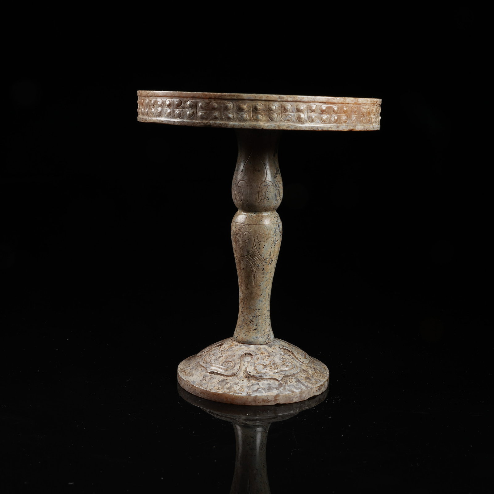 A ARCHAIC JADE THREE-PIECE COMBINED CANDLESTICK: Archaic jade three-piece combined candlestick