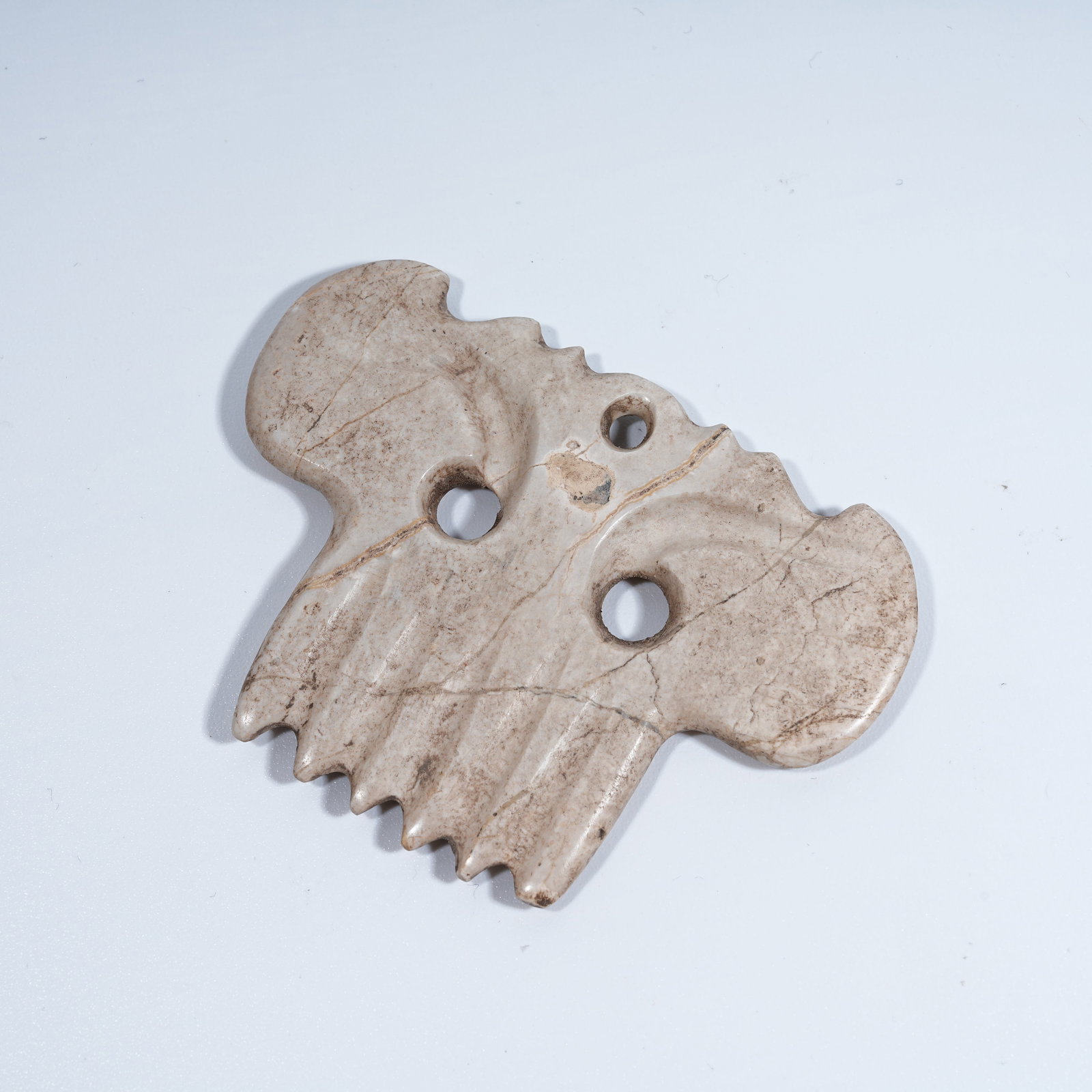 A HONGSHAN CULTURE ARCHAIC JADE ANTHROPOMORPHIC DEITY PENDANT: Hongshan Culture archaic jade anthropomorphic deity pendant