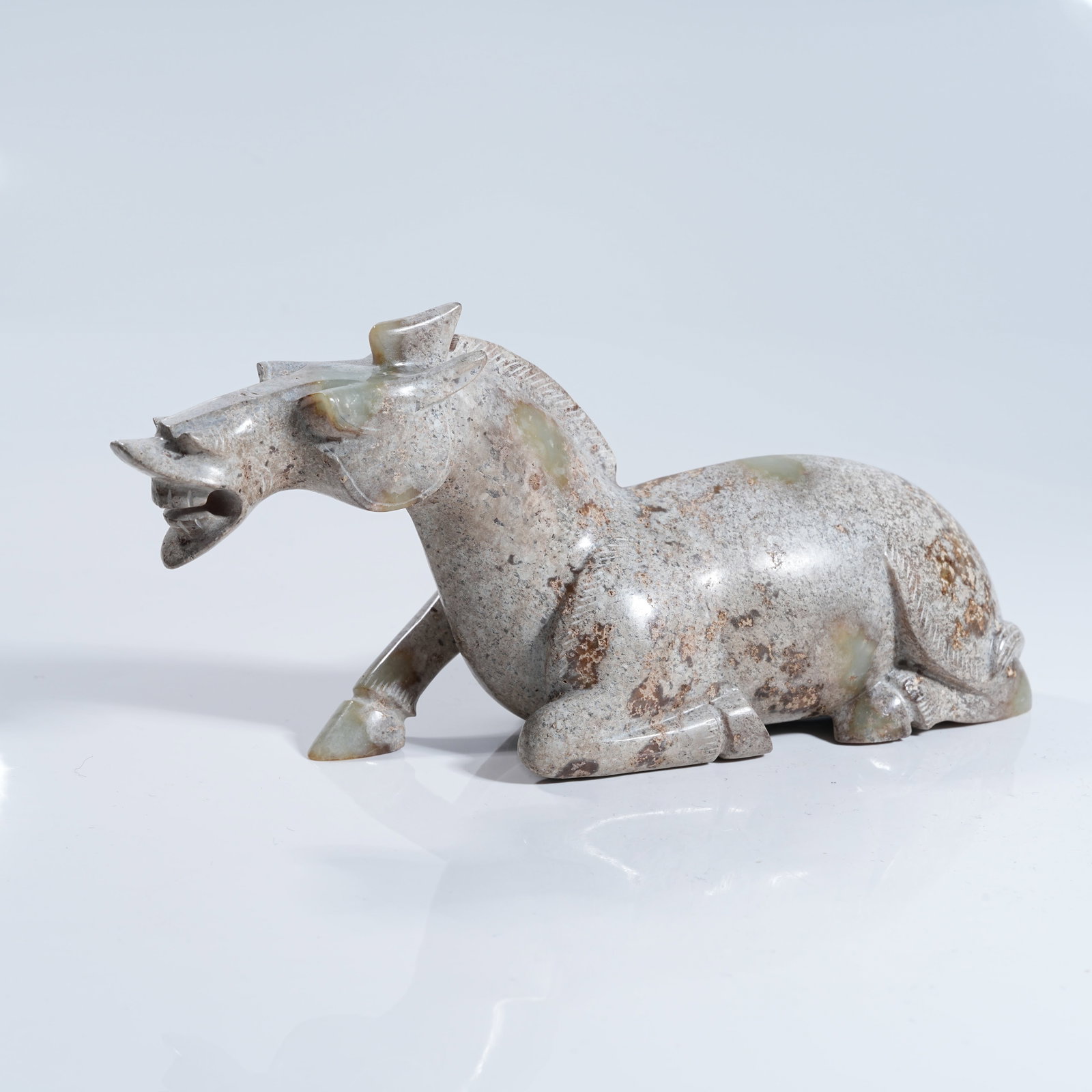 A ANCIENT JADE RECUMBENT HORSE ORNAMENT: Ancient Jade Recumbent Horse Ornament