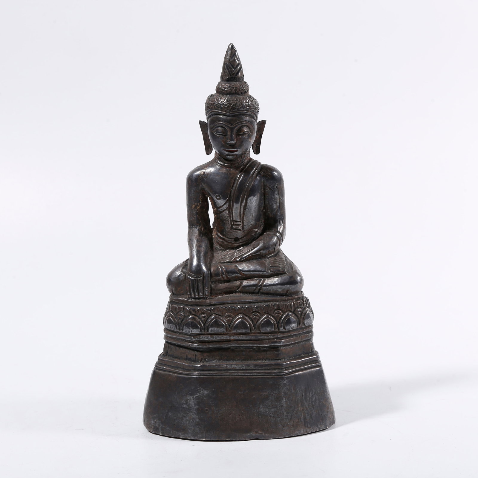 A SILVER BUDDHA STATUE (1 of 9)