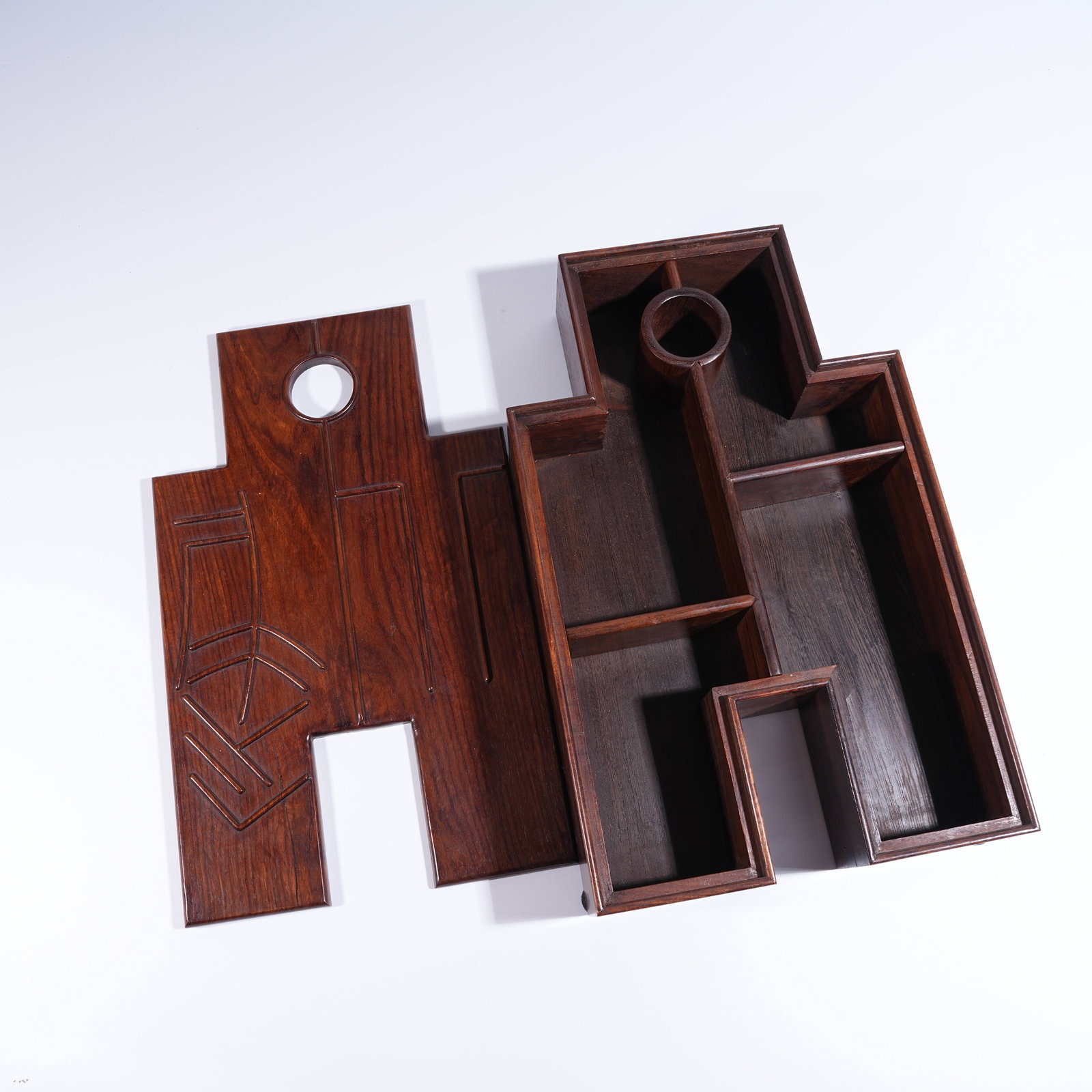 A HUANGHUALI COVERED BOX IN THE FORM OF ANCIENT COINS: Huanghuali Covered Box in the Form of Ancient Coins