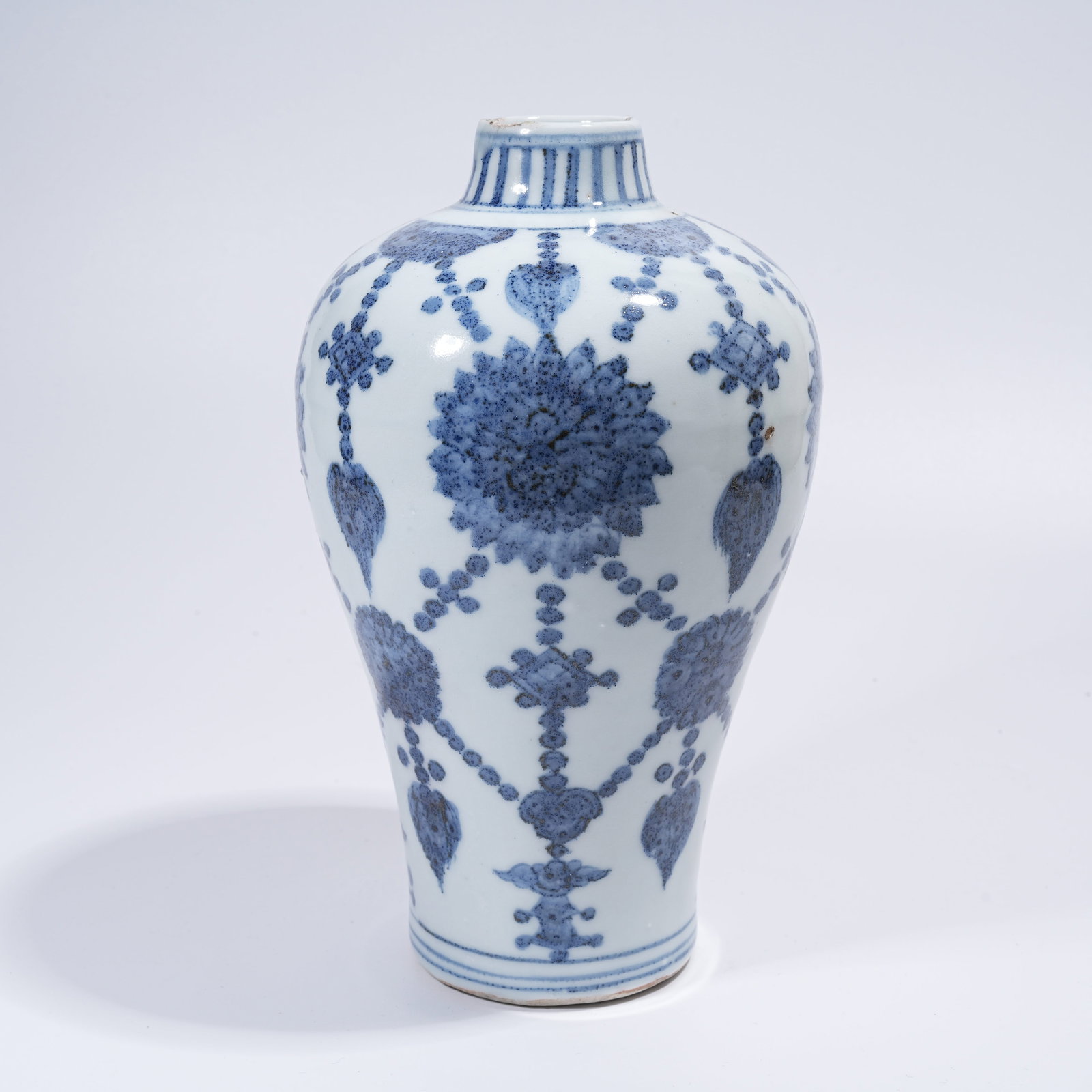 A BLUE AND WHITE MEIPING VASE WITH GARLAND PATTERN: Blue and White Meiping Vase with Garland Pattern