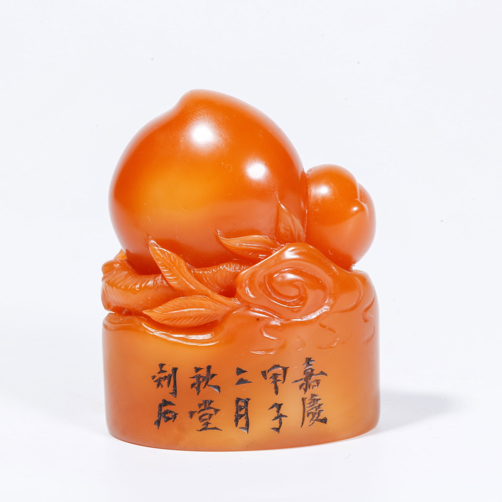 A SHOUSHAN TIANHUANG STONE SEAL WITH LONGEVITY PEACH KNOB: Shoushan Tianhuang Stone Seal with Longevity Peach Knob